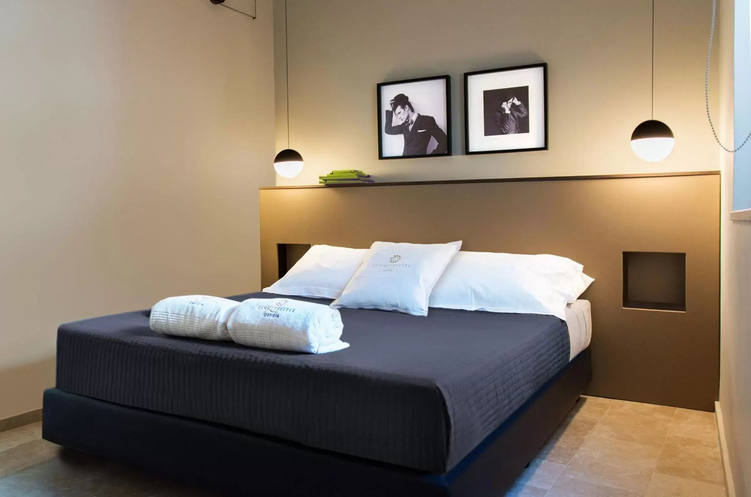 Bed in CinqueSuites Ortigia Bed in CinqueSuites Ortigia