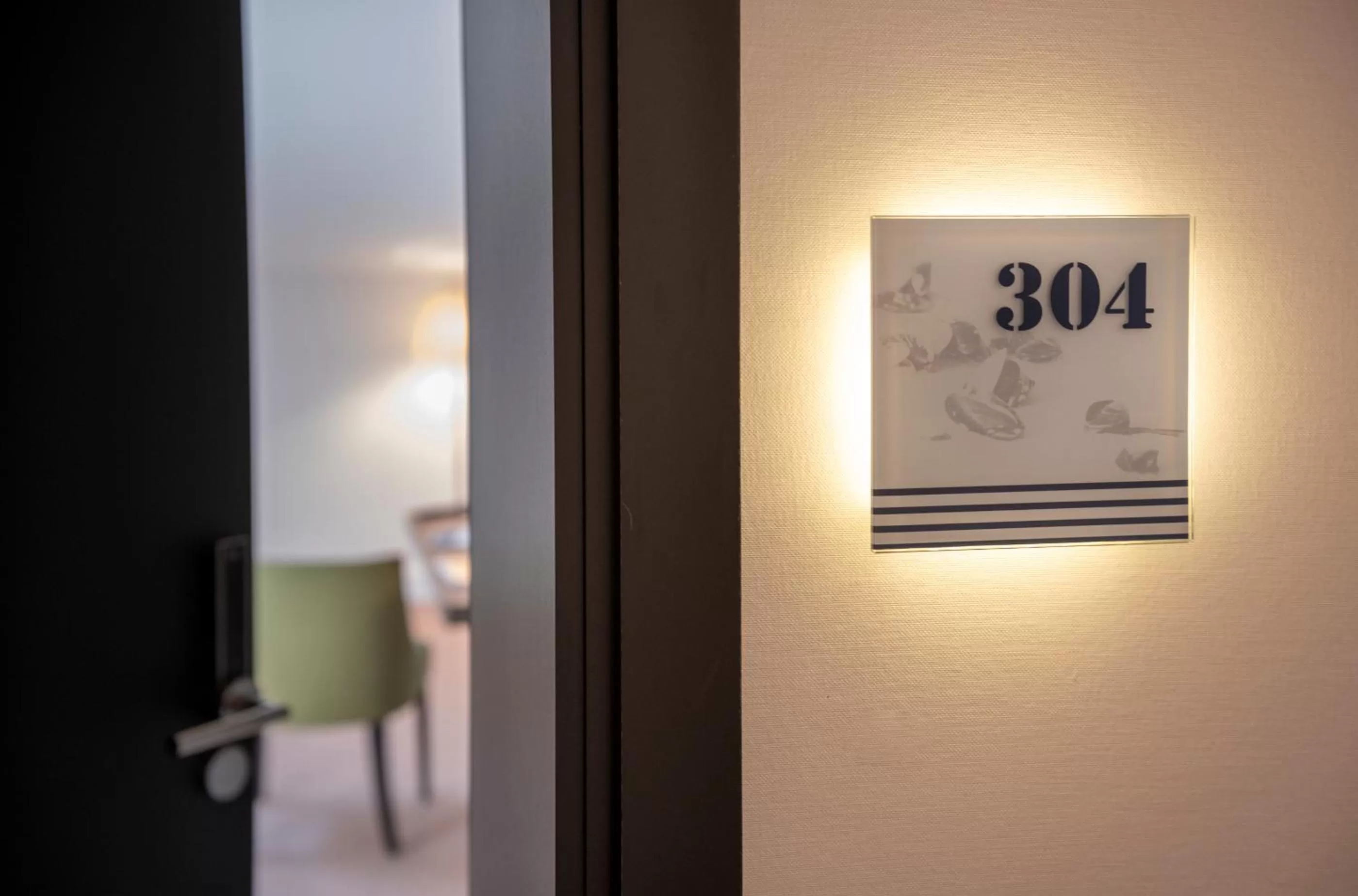 Property logo or sign in Hotel Am Leuchtturm