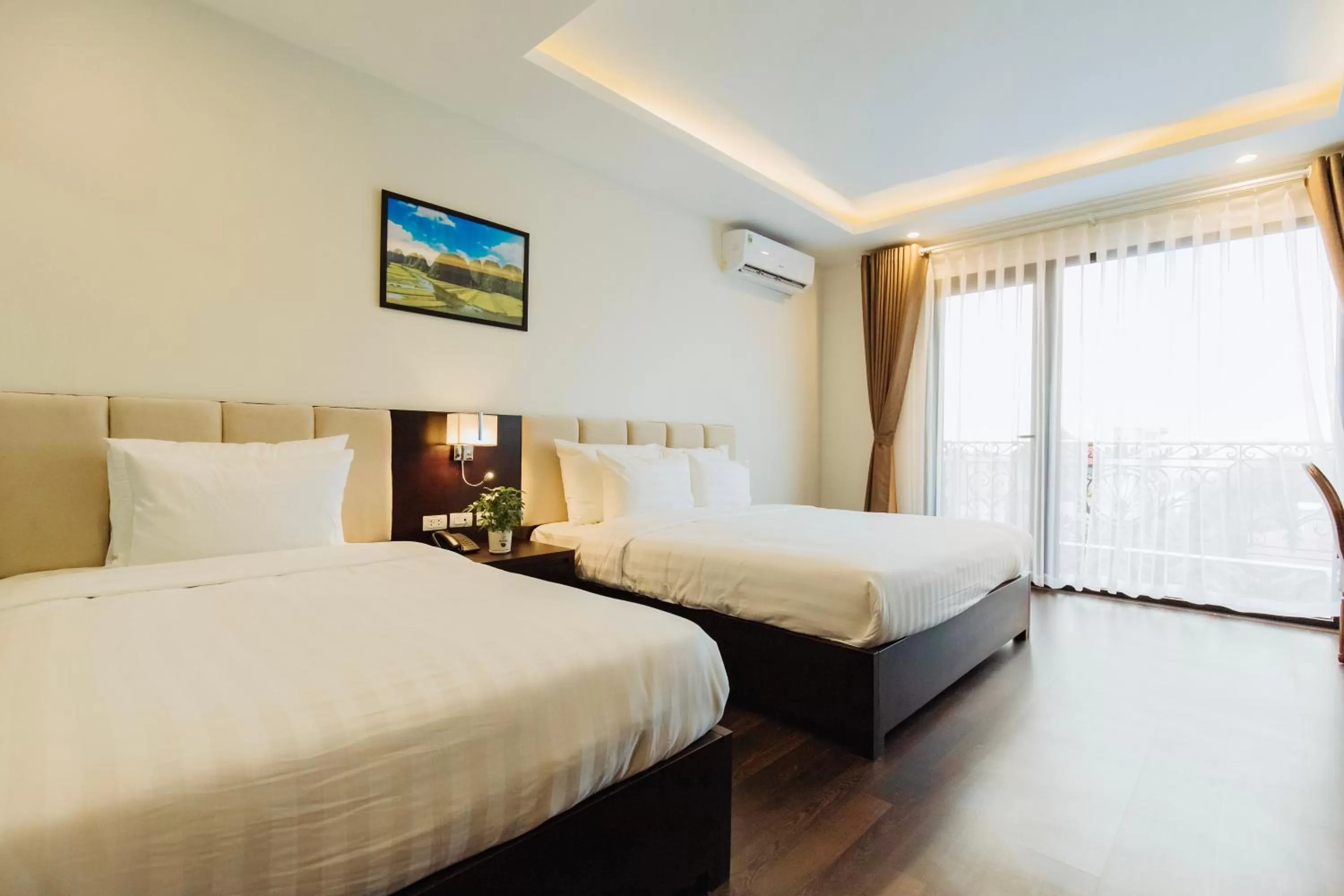 Bed in Paragon Noi bai Hotel & Pool