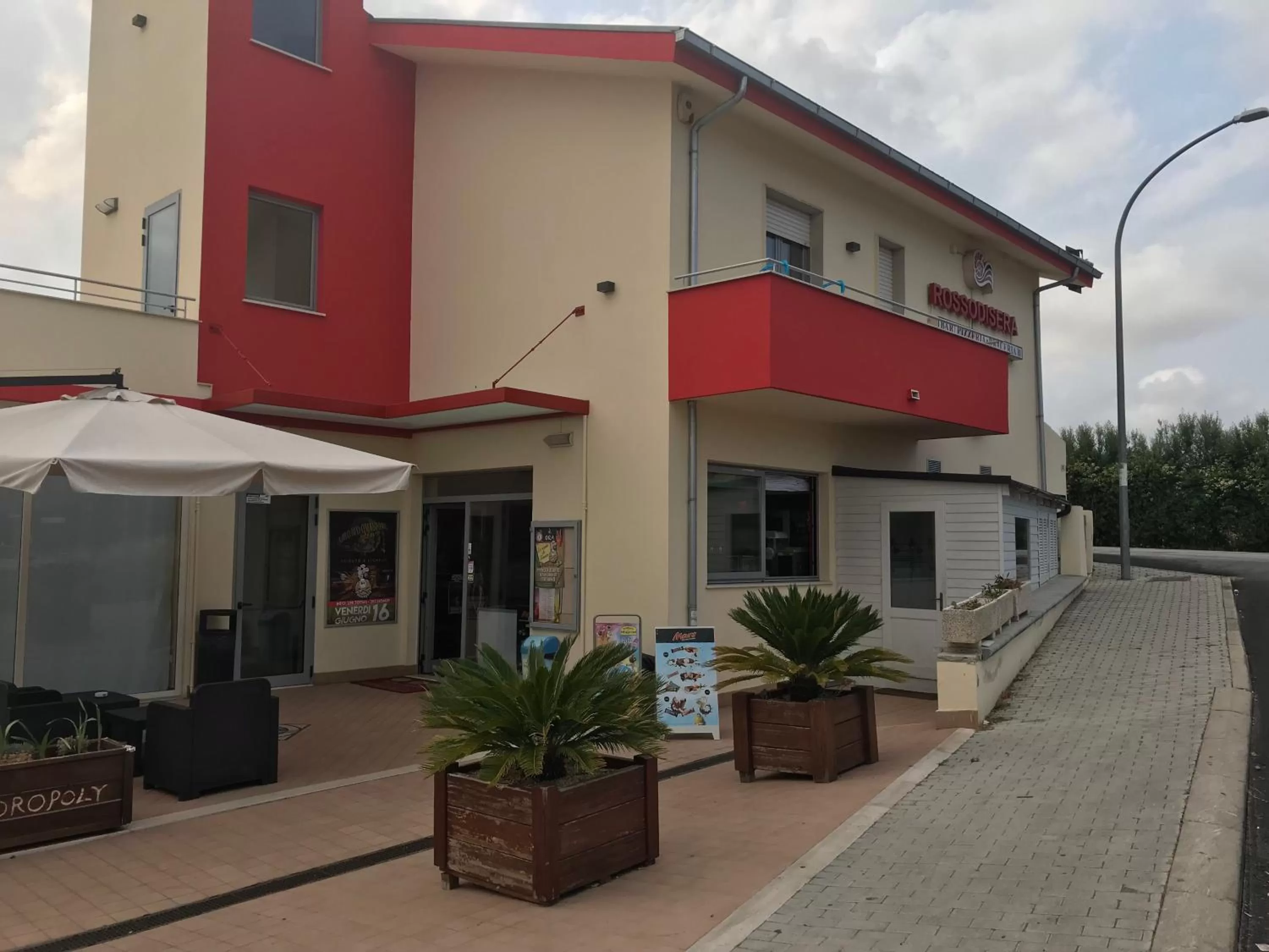 Facade/entrance, Property Building in Rosso Di Sera