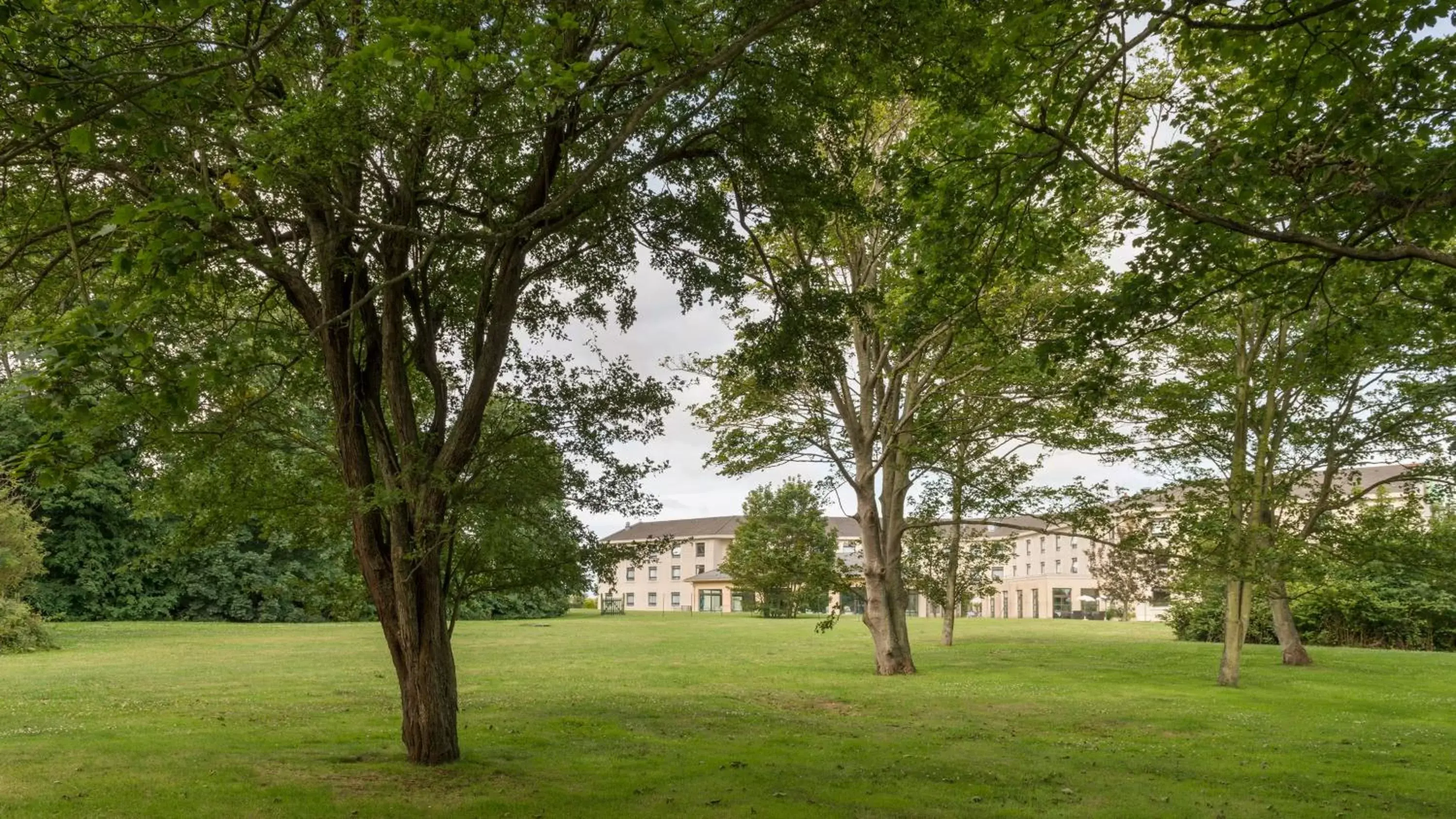 Property building, Garden in Holiday Inn Calais Coquelles, an IHG Hotel