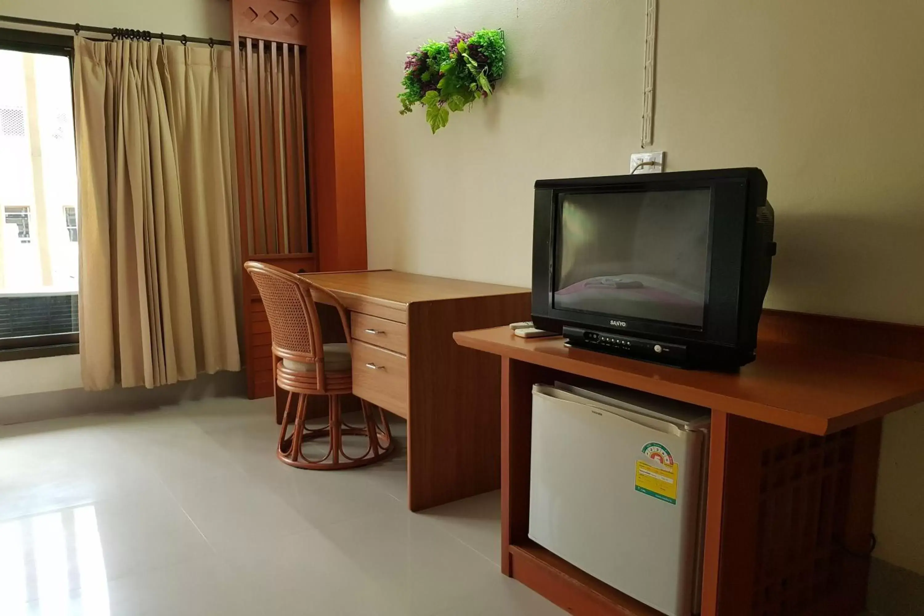 TV and multimedia, TV/Entertainment Center in Poonsook Phitsanulok Hotel SHA Plus