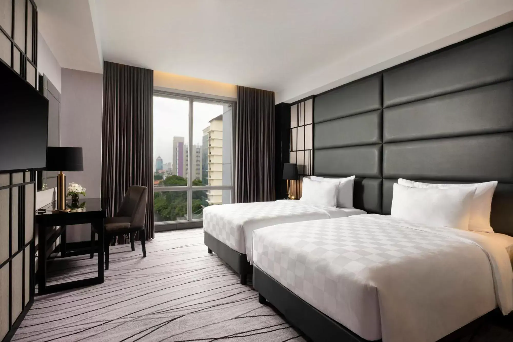 Bed in Grand Swiss-Belhotel Darmo Bed in Grand Swiss-Belhotel Darmo