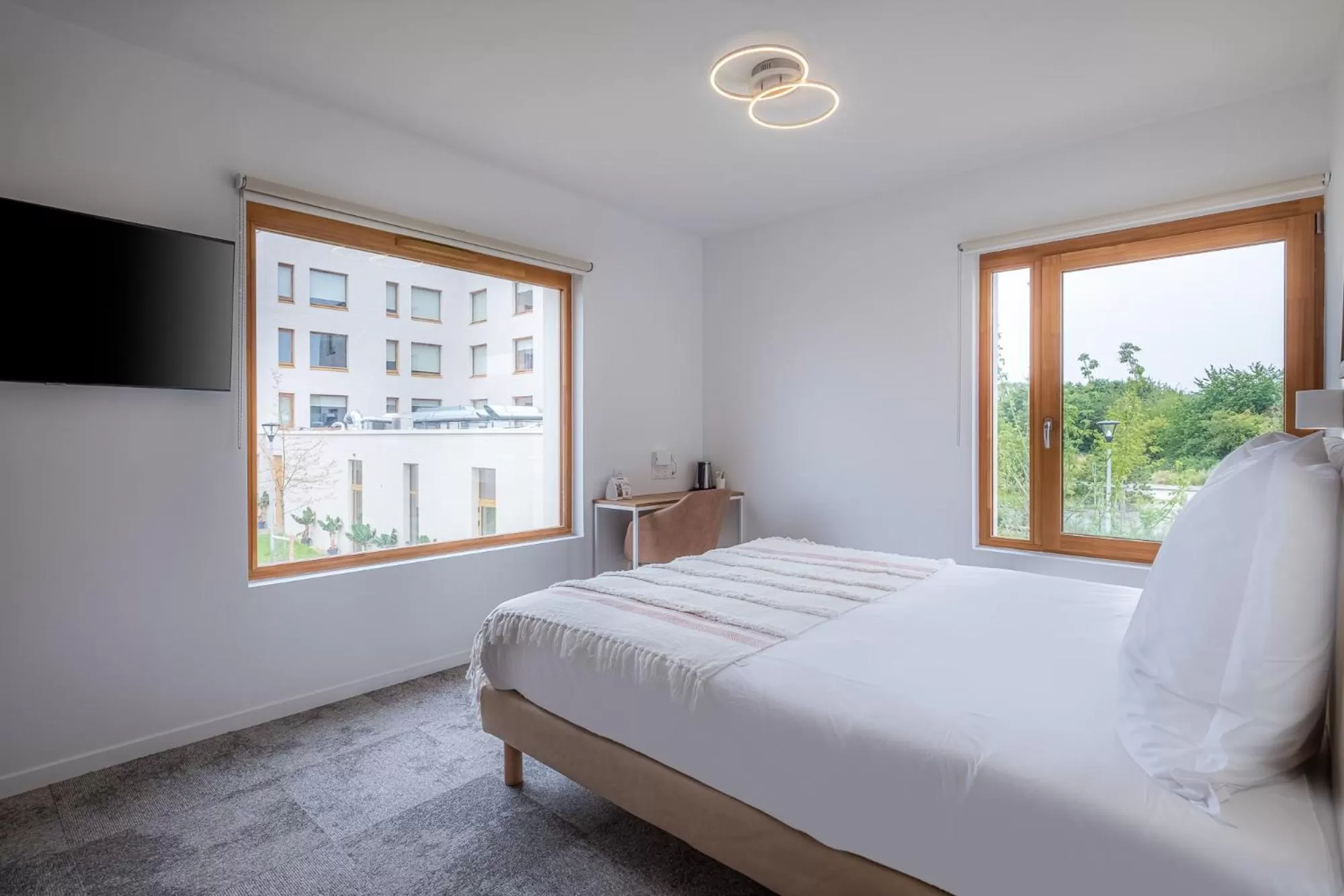 Bed in The Originals Boutique Hôtel Amiens Sud