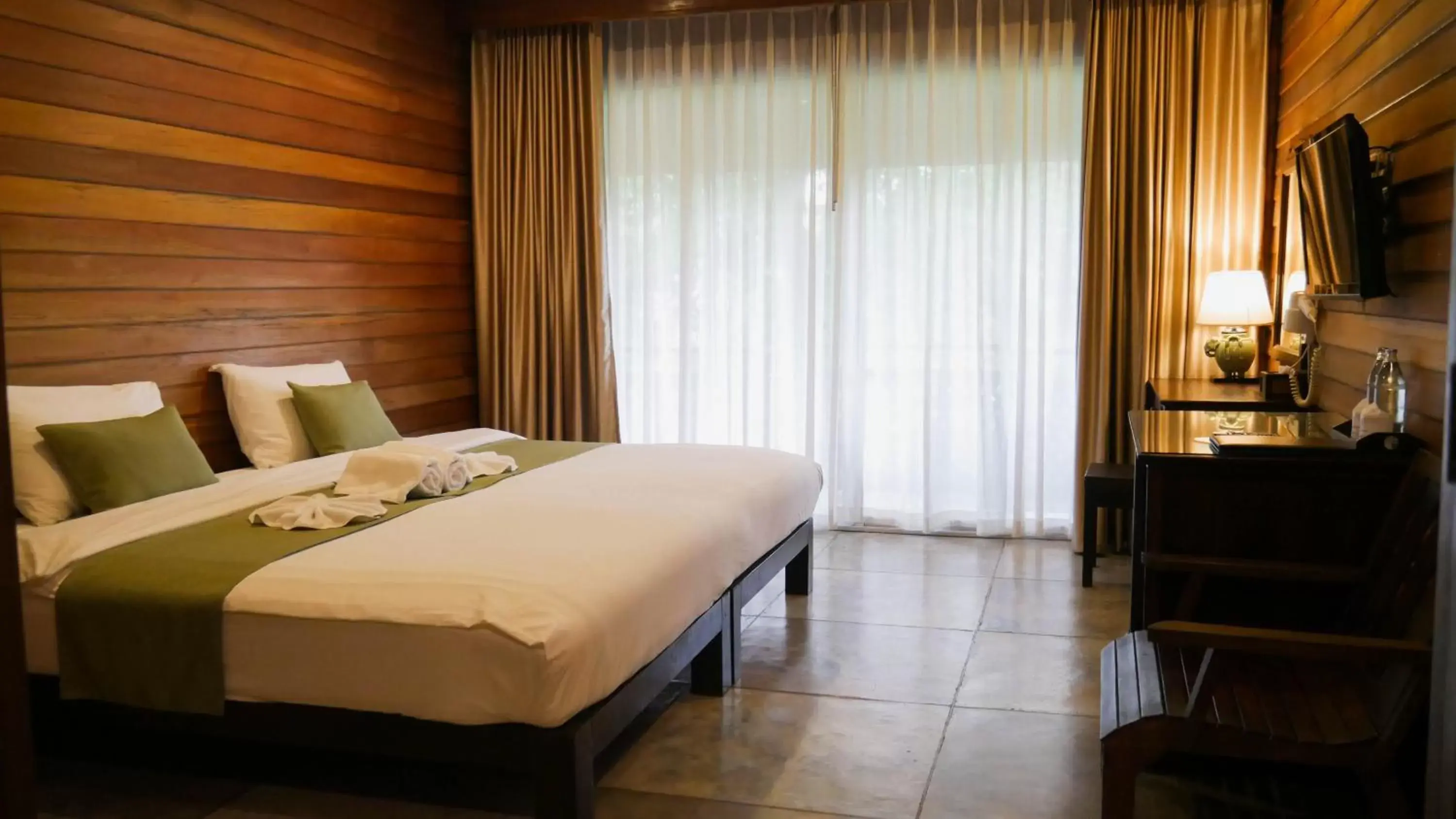 Bed in Royal River Kwai Resort and Spa -SHA Extra Plus