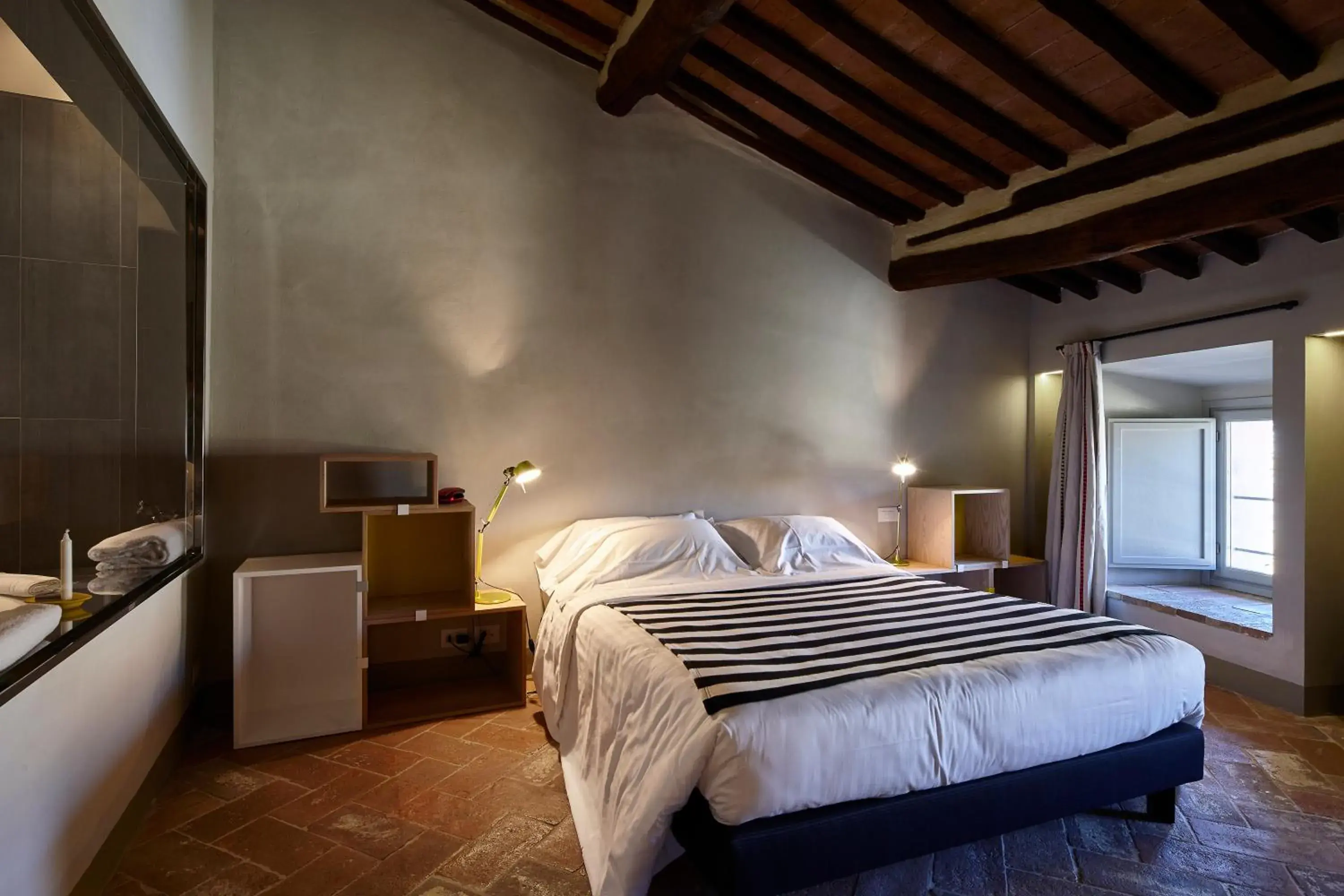 Bed in Palazzetto Rosso - Art Hotel