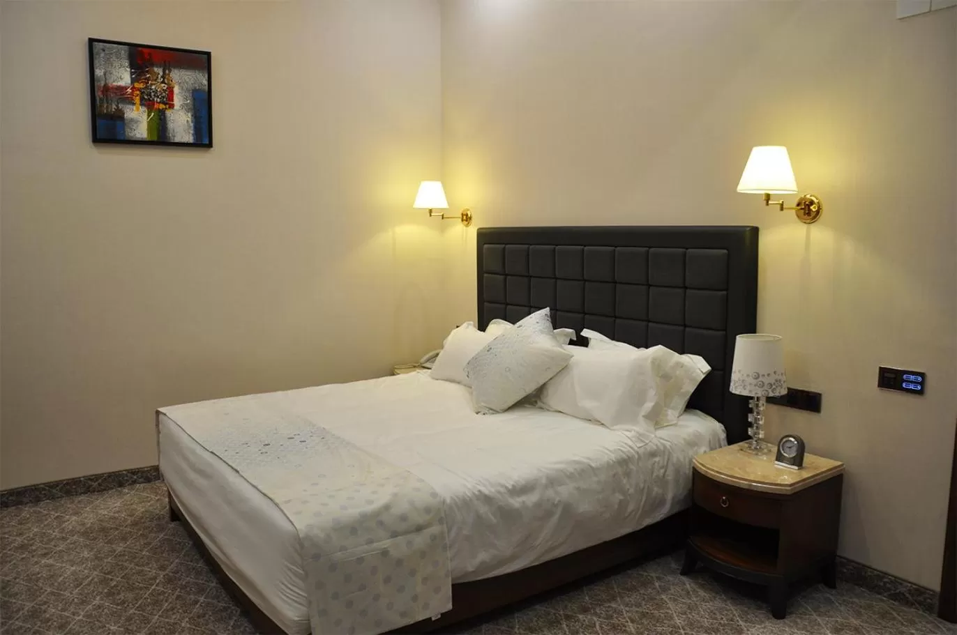 Bed in Parliament Palace Hotel