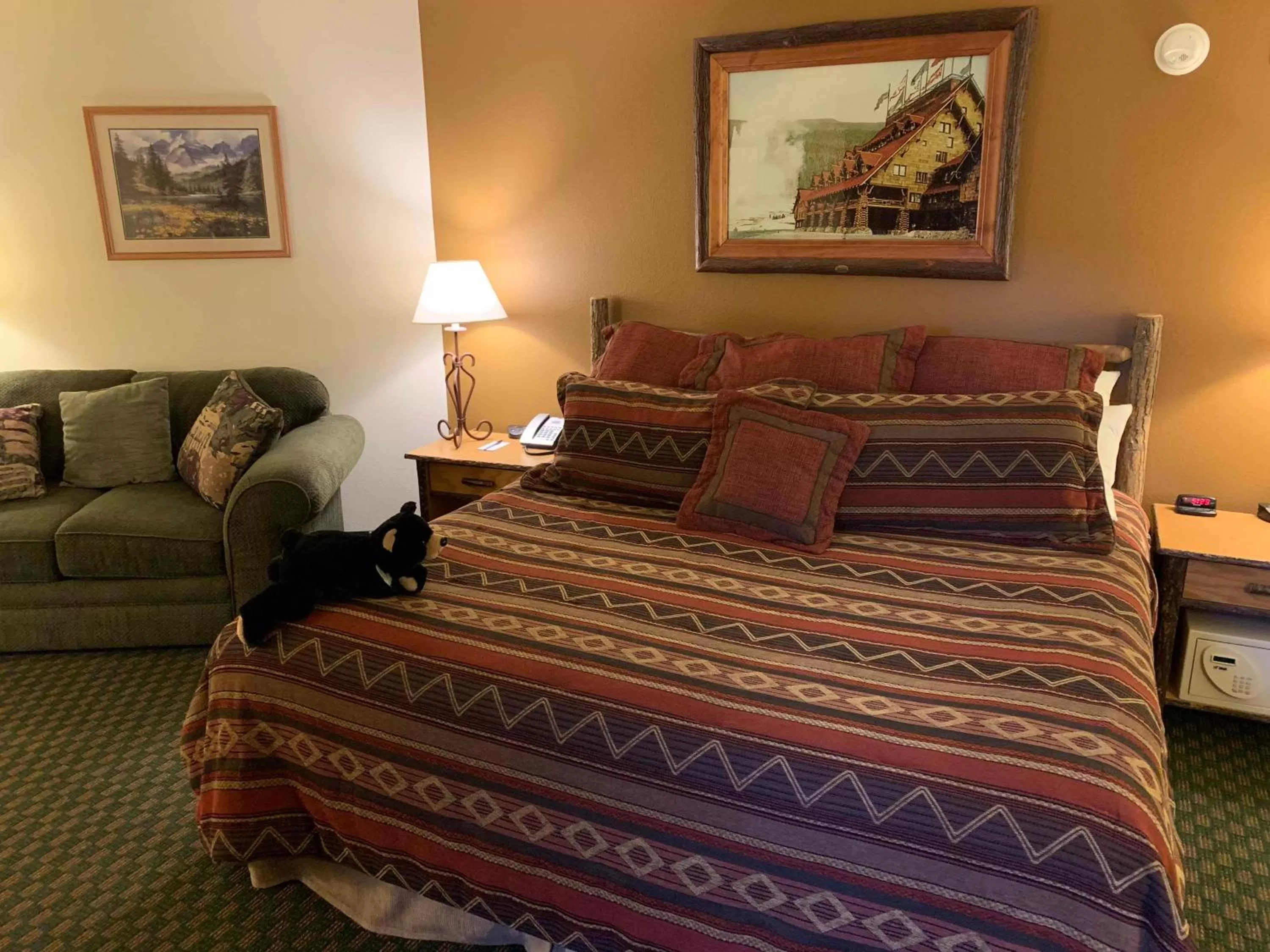 Bed in AmericInn by Wyndham Cody