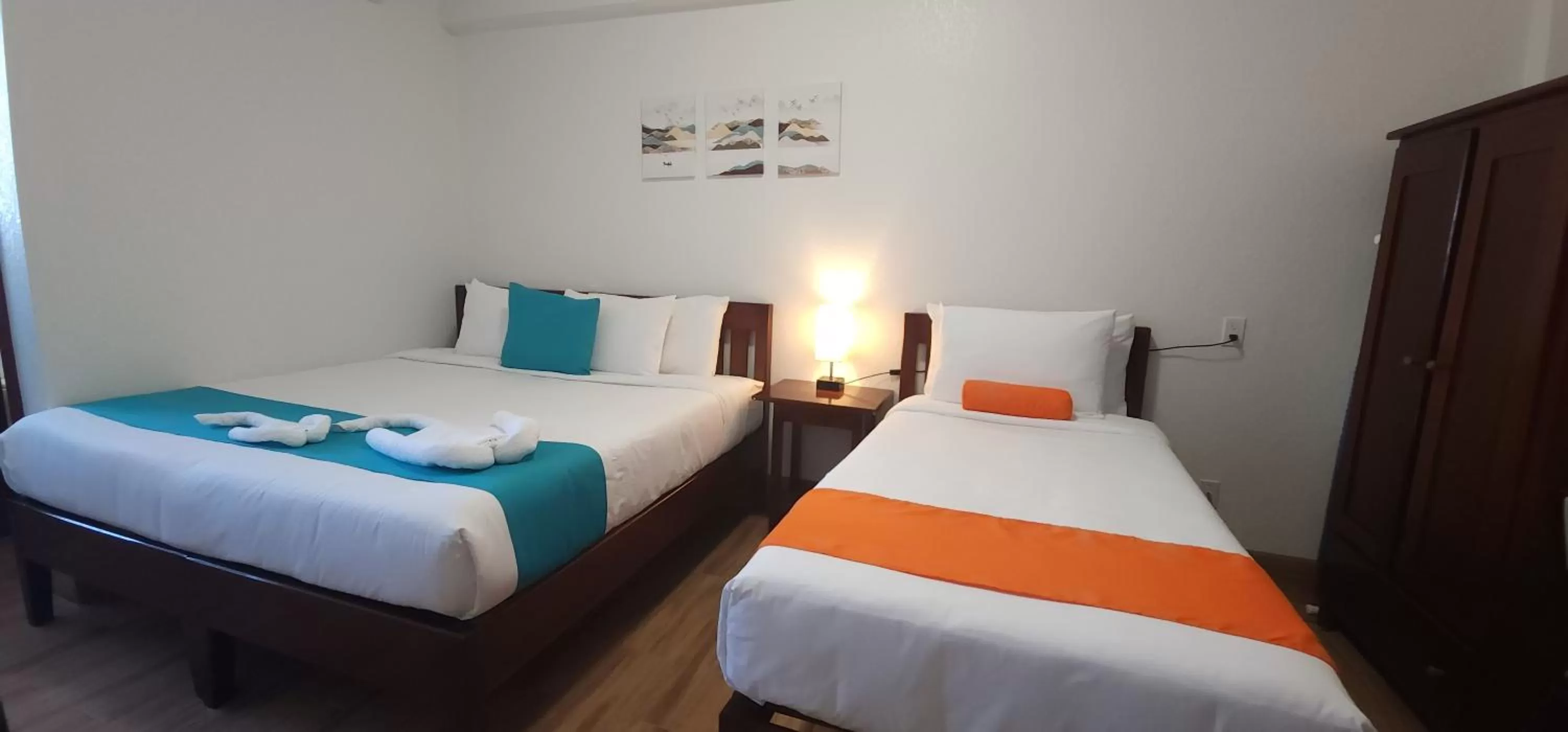 Bed in Voyager Sun & Reef Hotel