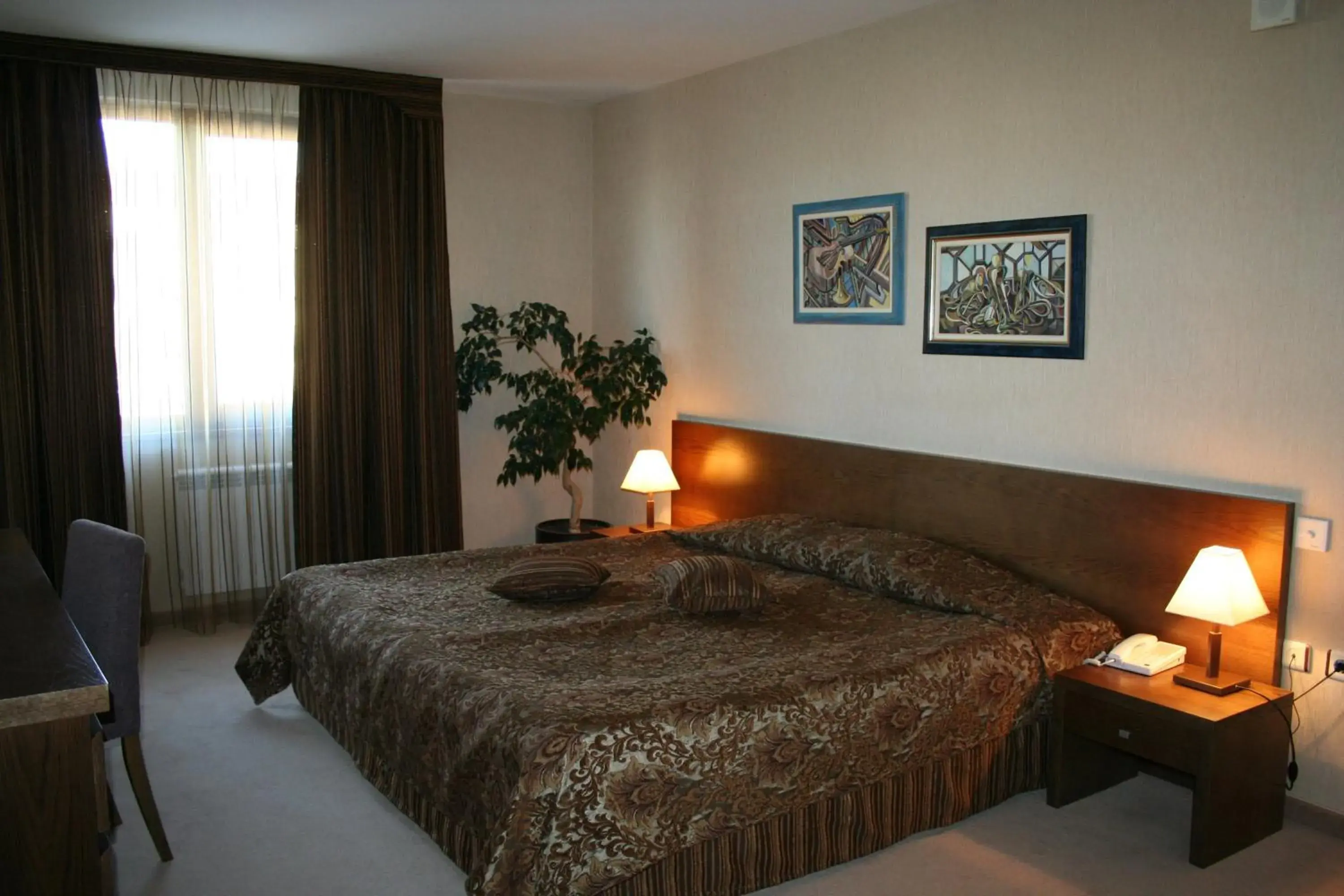 Bed in Evelina Palace Hotel