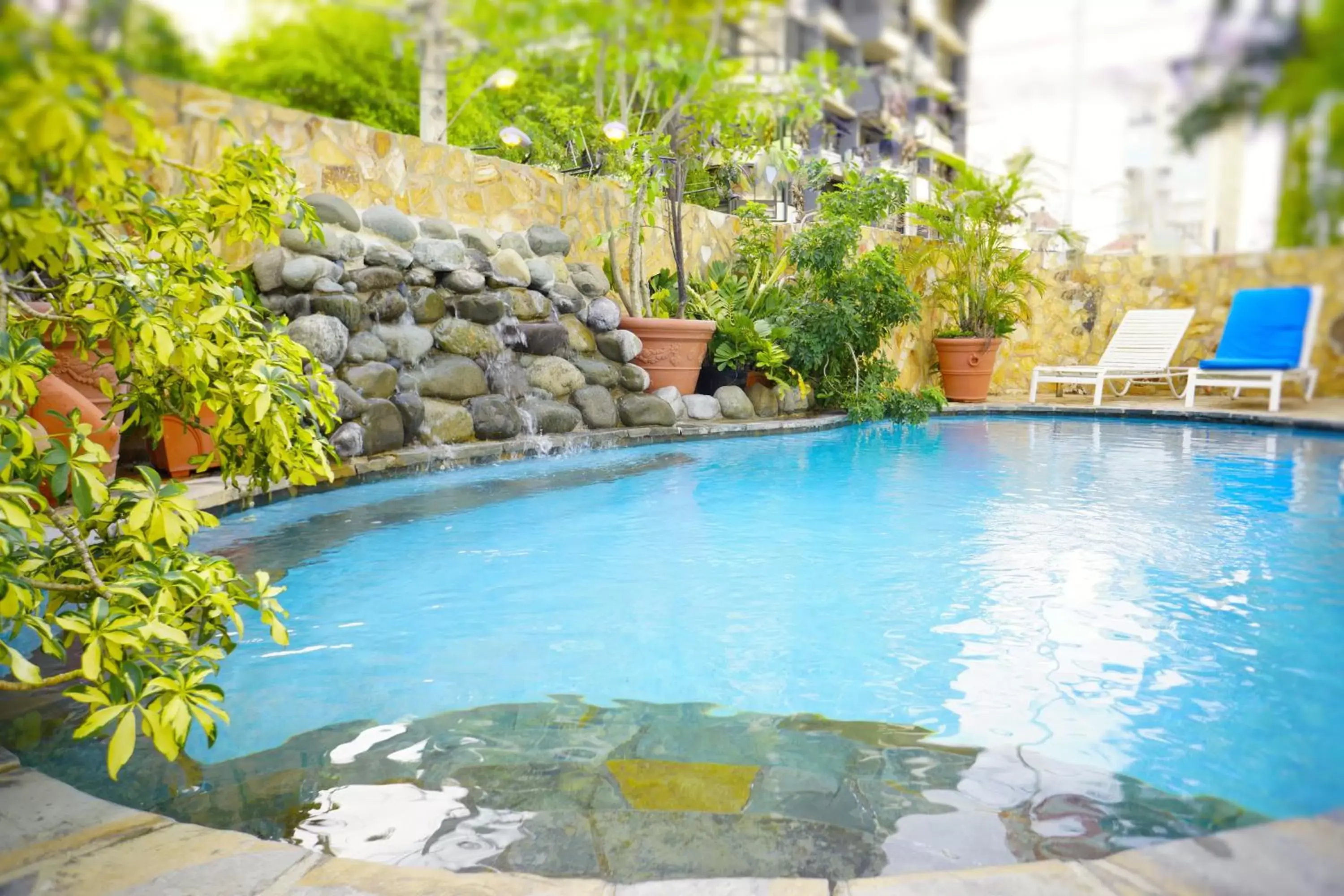 Day, Swimming Pool in At Wind Chimes Boutique Hotel