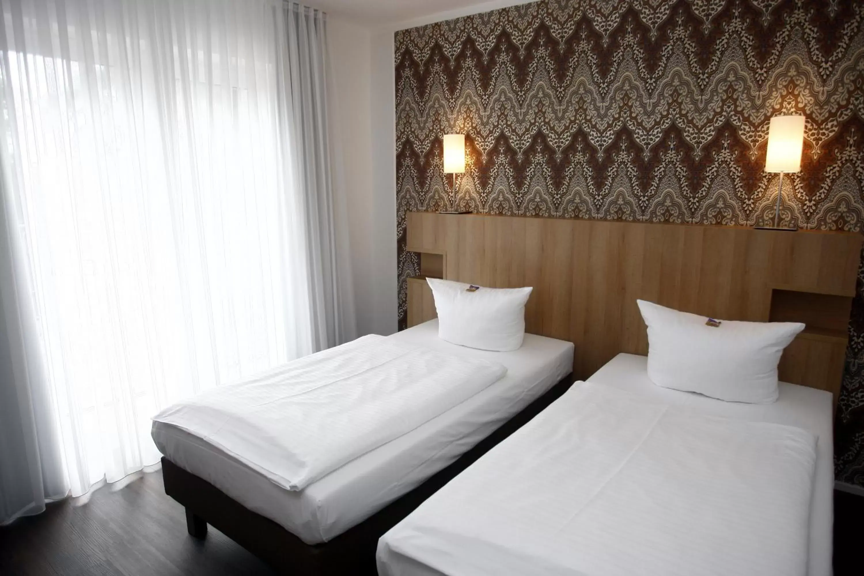 Bed in Hotel Westerkamp