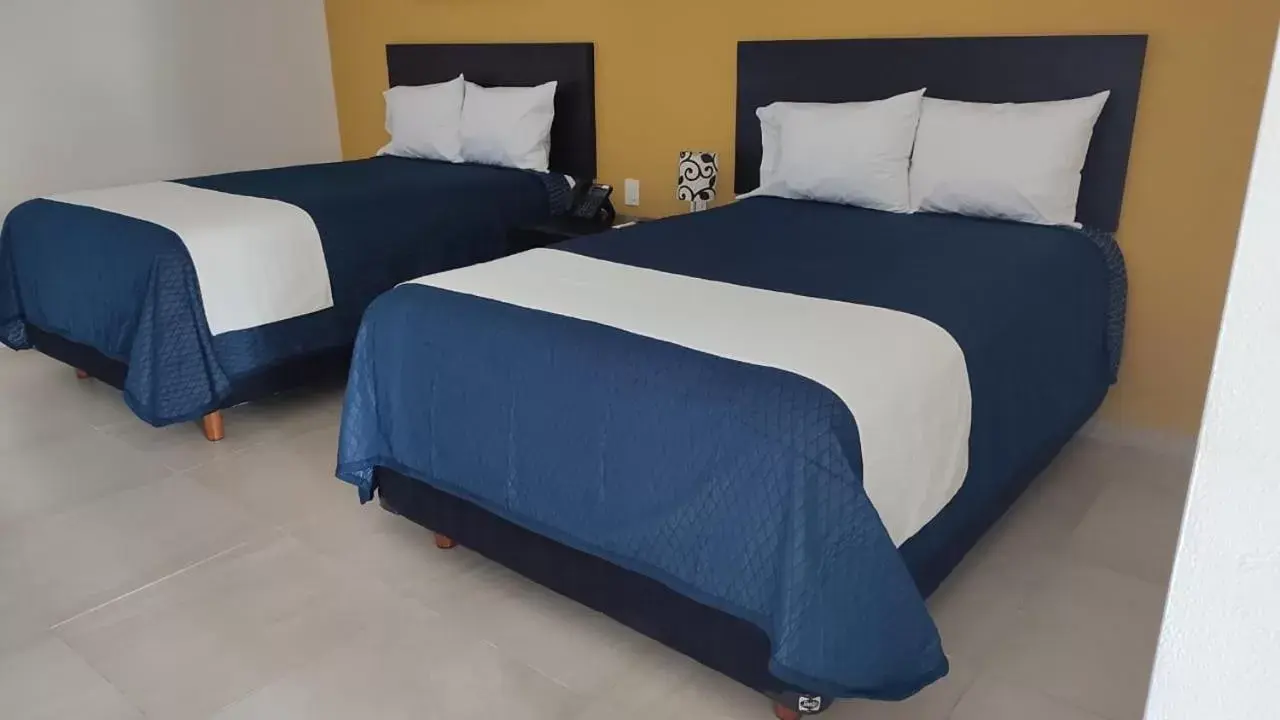 Bed in Casa Blanca Hotel