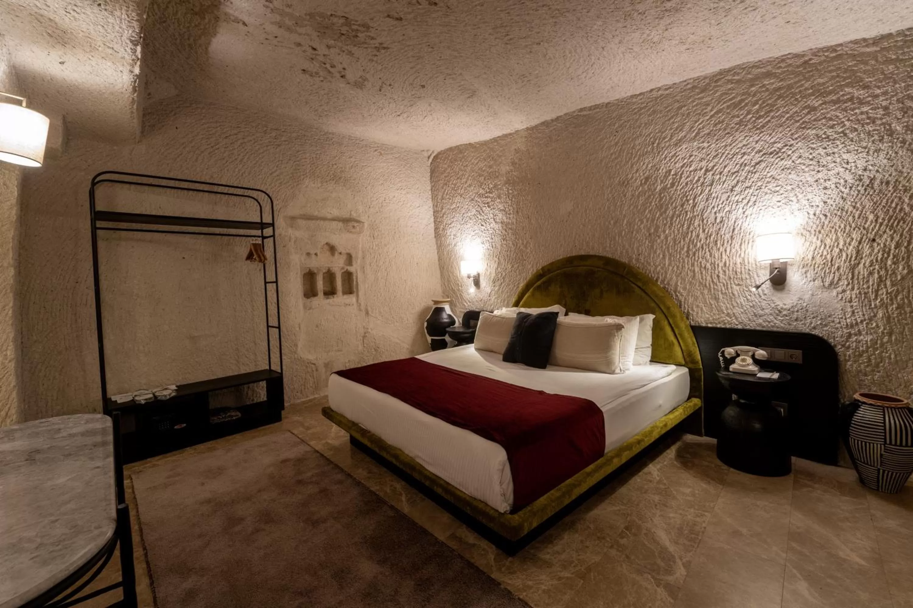 Bedroom, Bed in Artemis Cave Suites & Spa- Adults Only