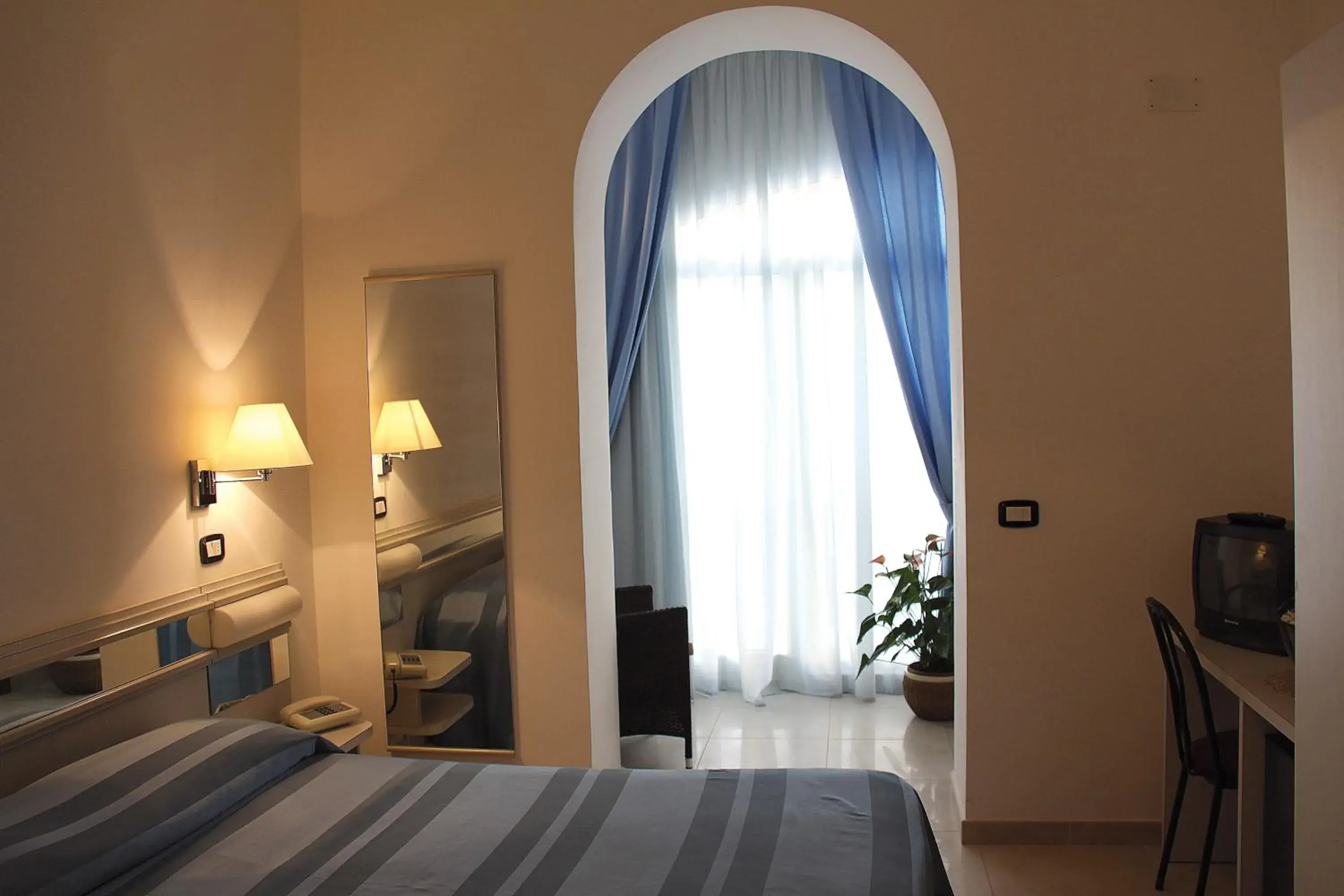 Bed in Hotel Falcone