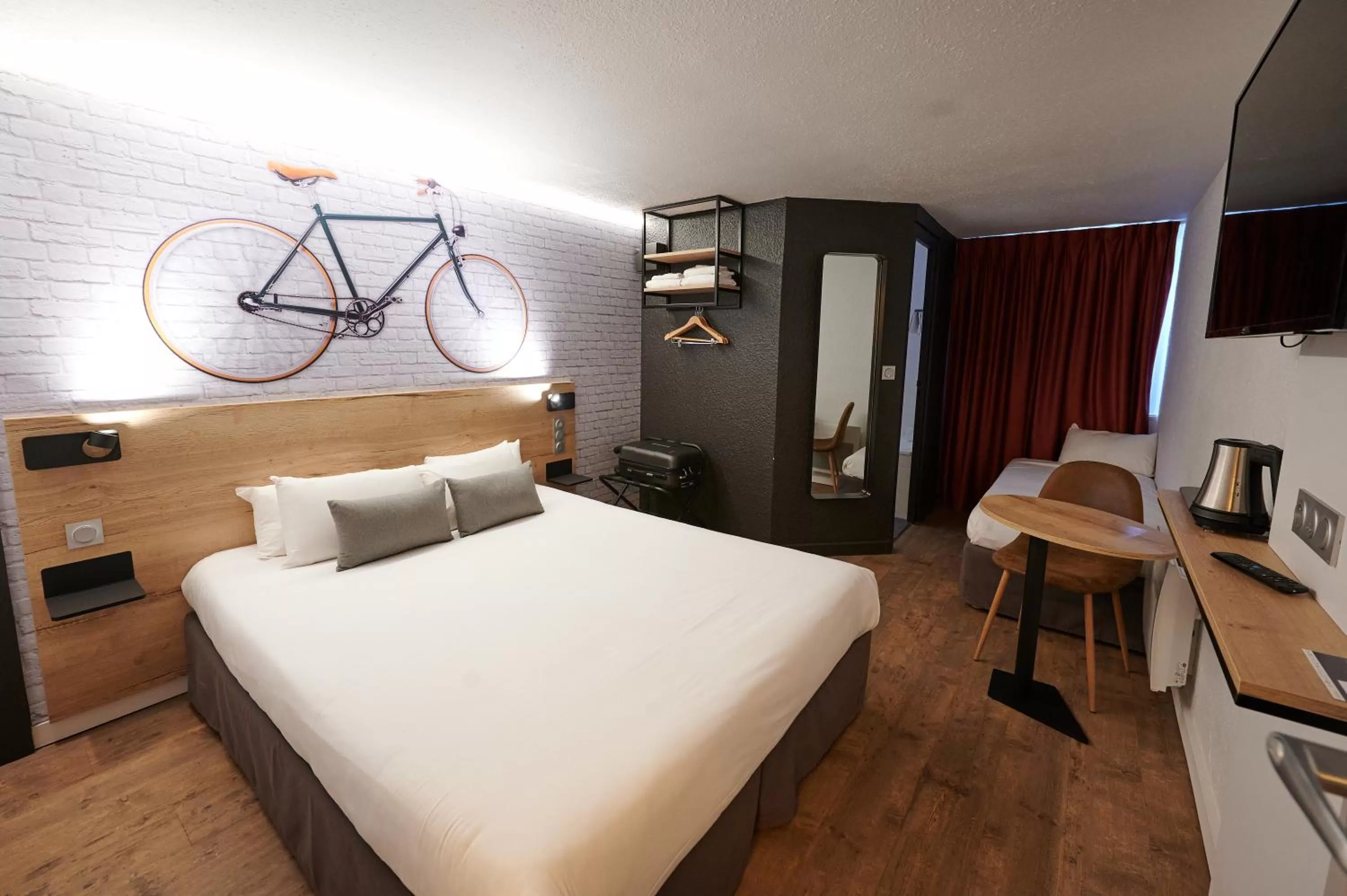 Photo of the whole room, Bed in Kyriad Hotel Laval