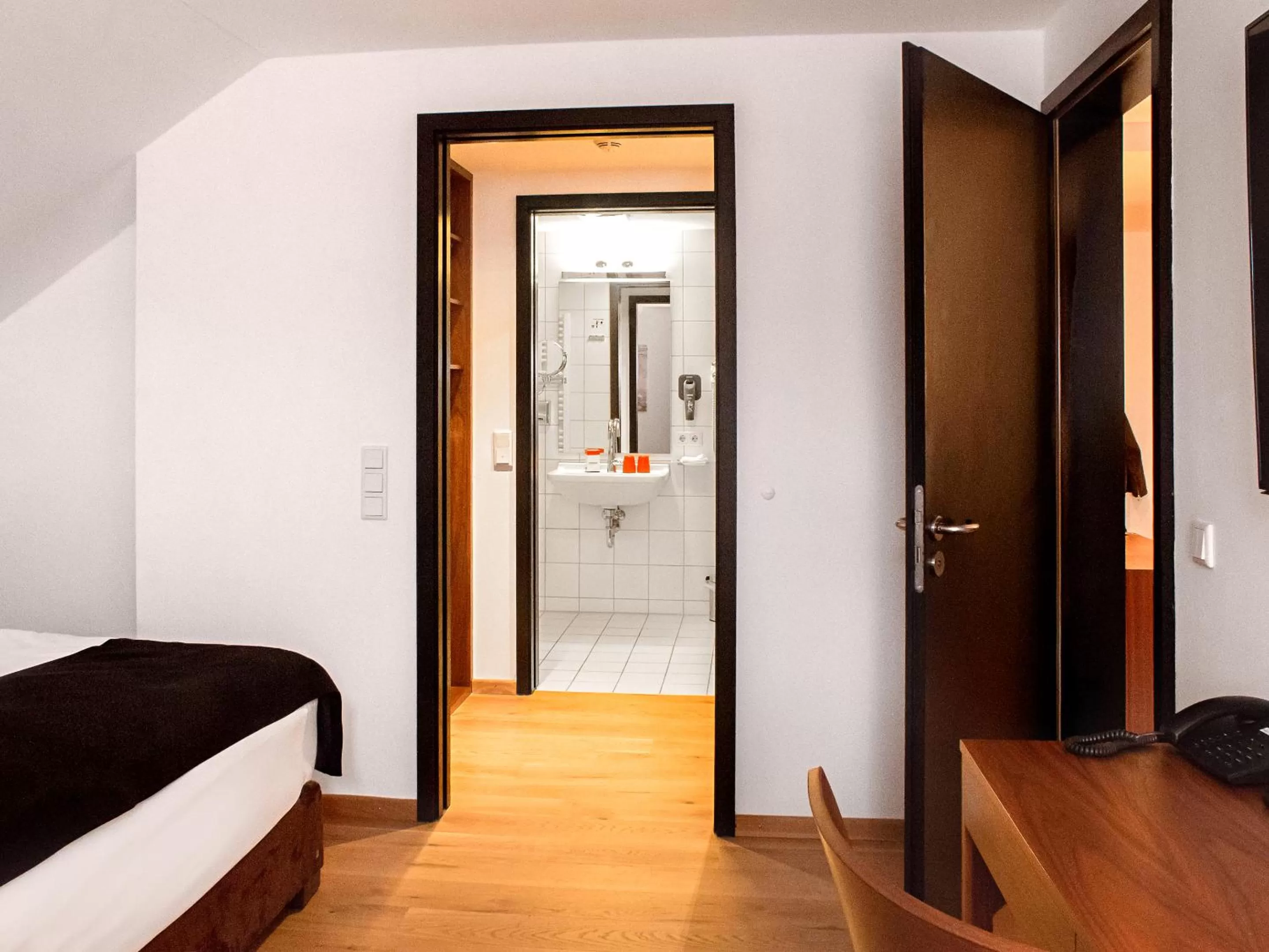 Photo of the whole room, Bed in DORMERO Hotel Kelheim