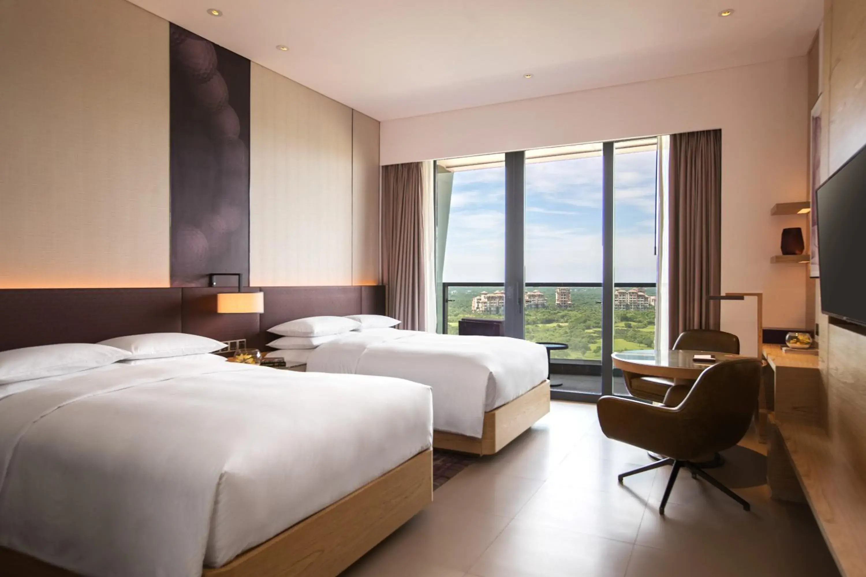 Bedroom in Renaissance Haikou Hotel