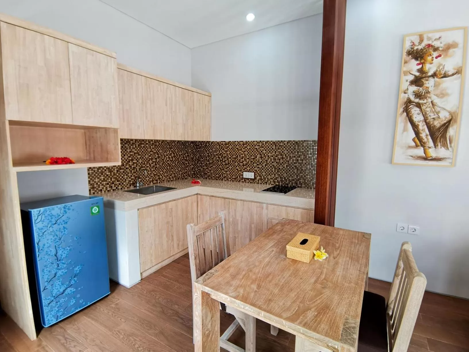 Kitchen or kitchenette in Kuta Puri Bungalows, Villas and Resort