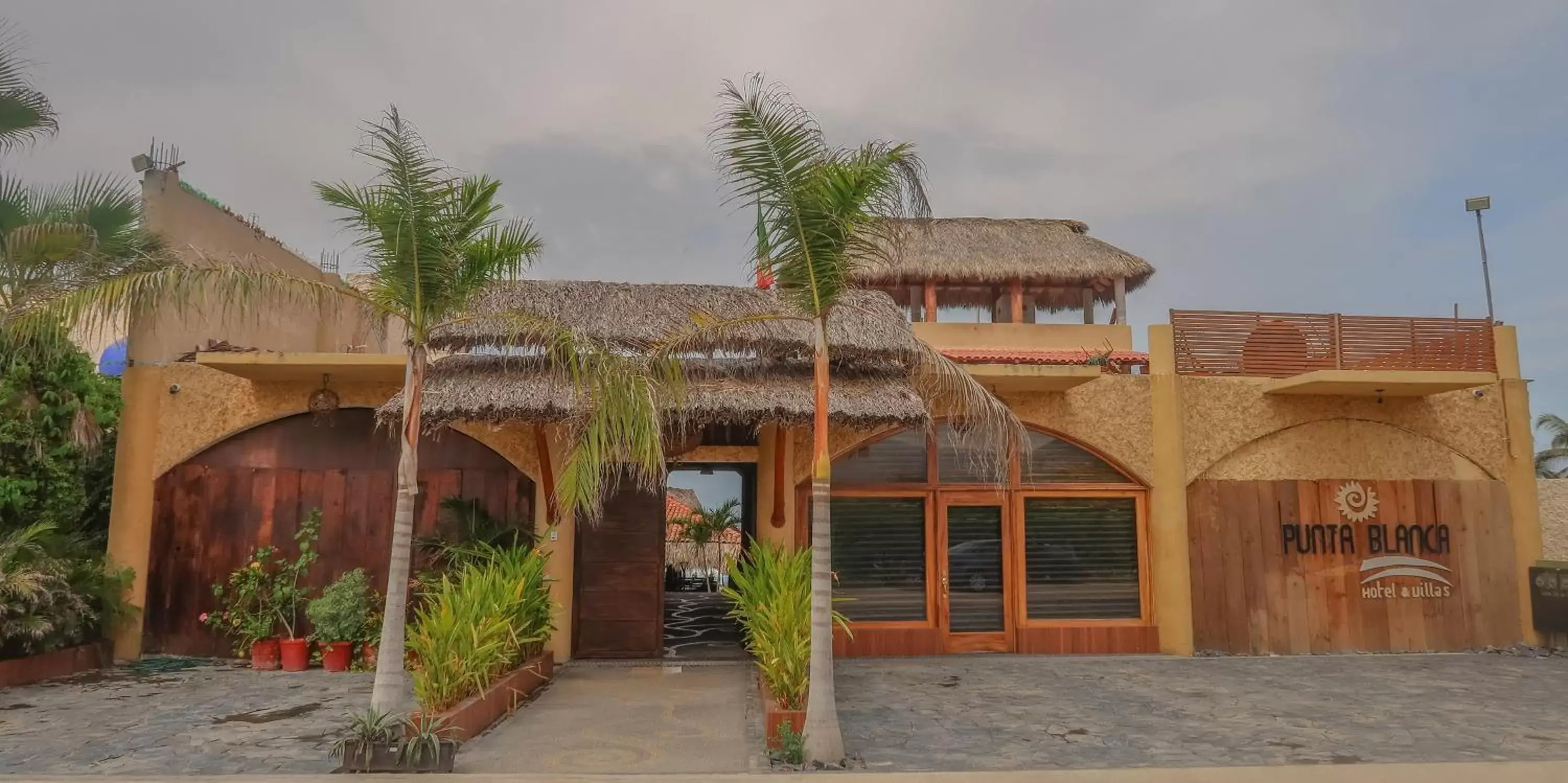 Facade/entrance, Property Building in Hotel Villas Punta Blanca