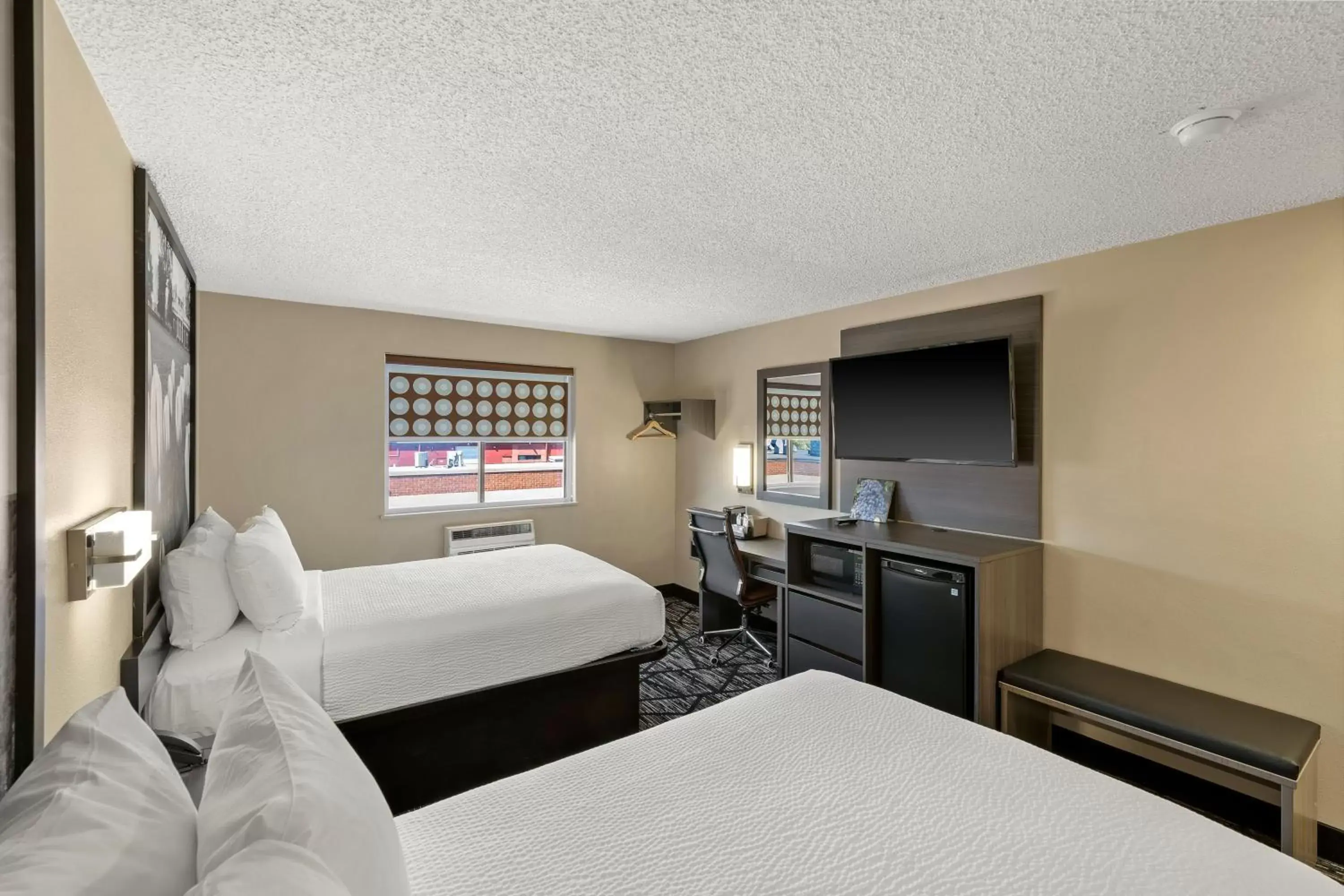 Bed in Super 8 by Wyndham Charlottesville