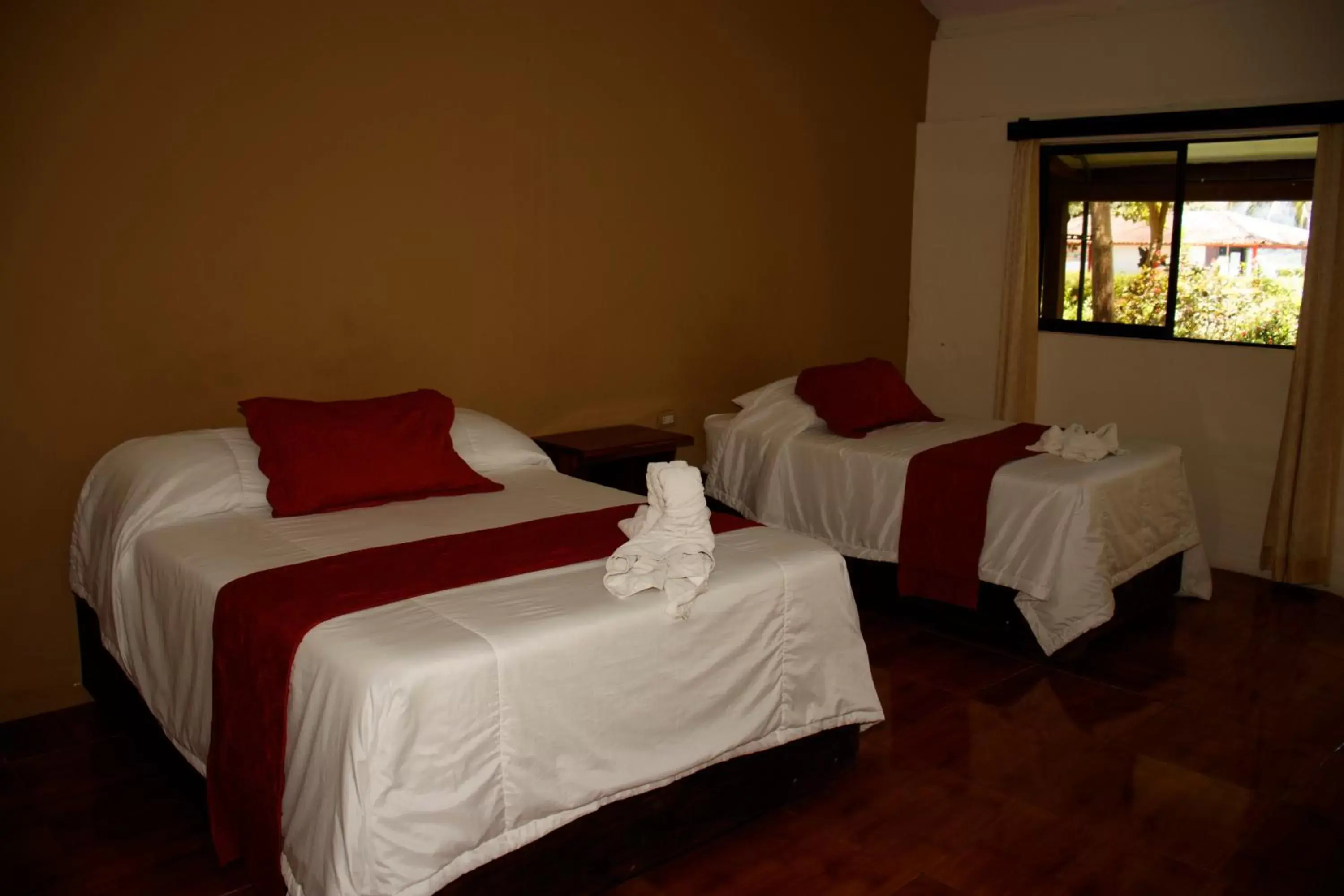 Photo of the whole room, Bed in Hotel Samoa del Sur