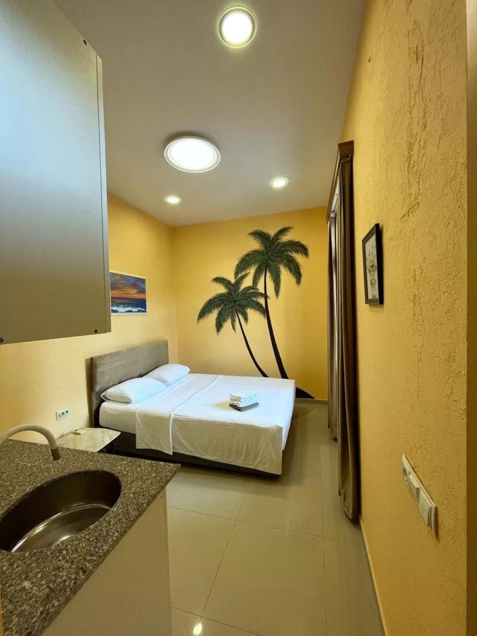 Photo of the whole room, Bed in OLD ClTY HOTEL BATUMI