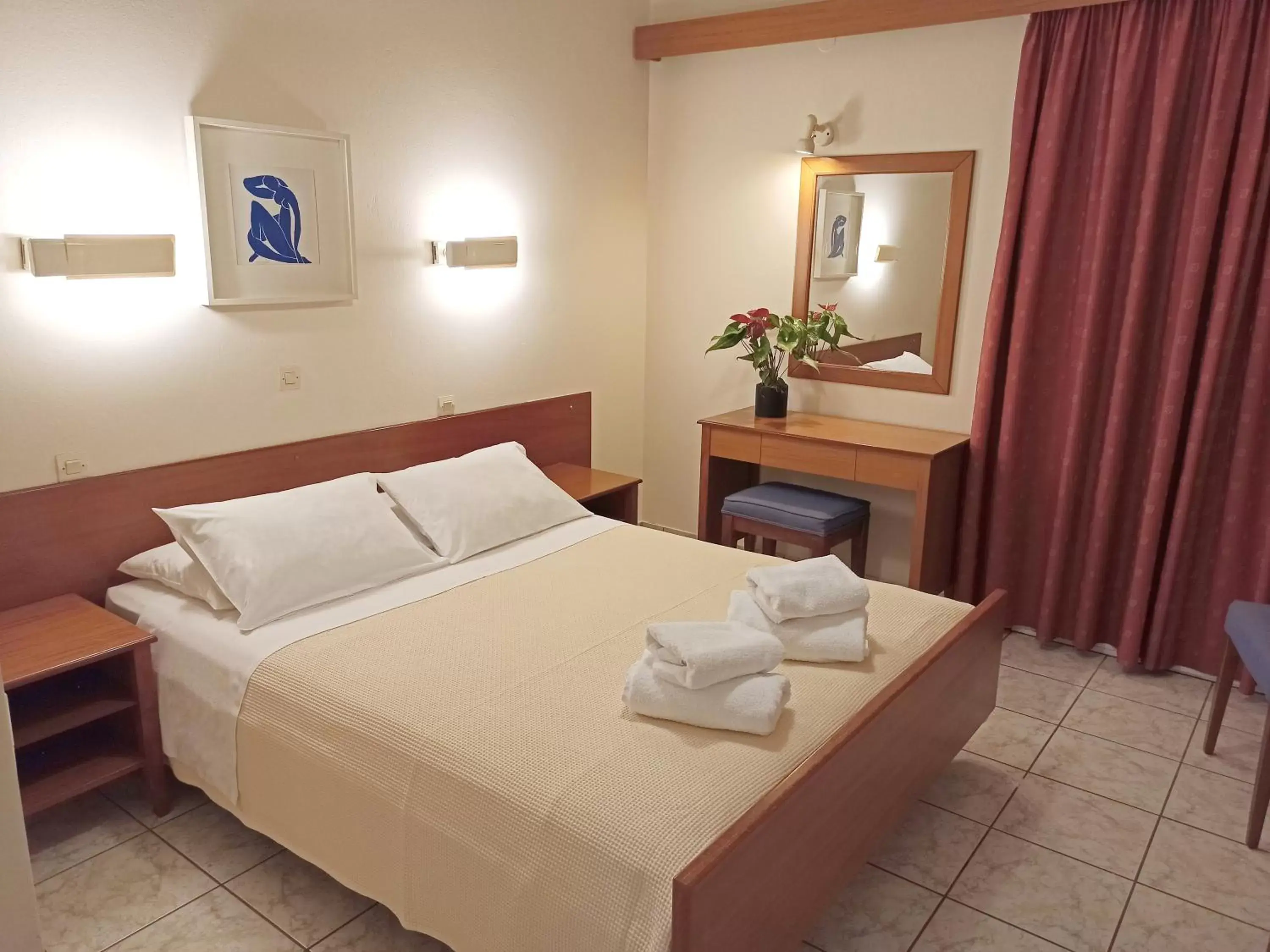 Bed in Dioni Hotel