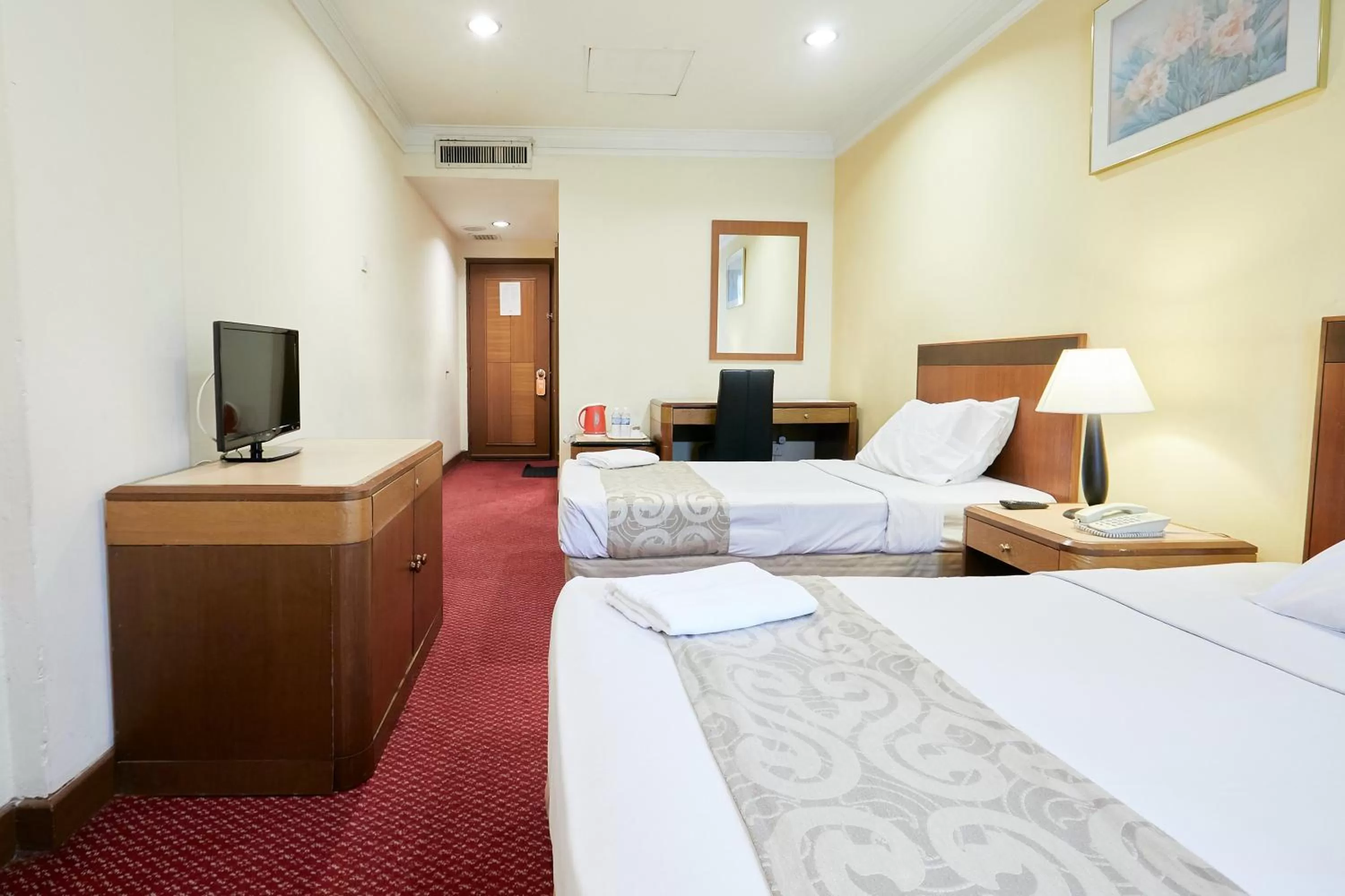 Bed in Grand Pacific Hotel PWTC