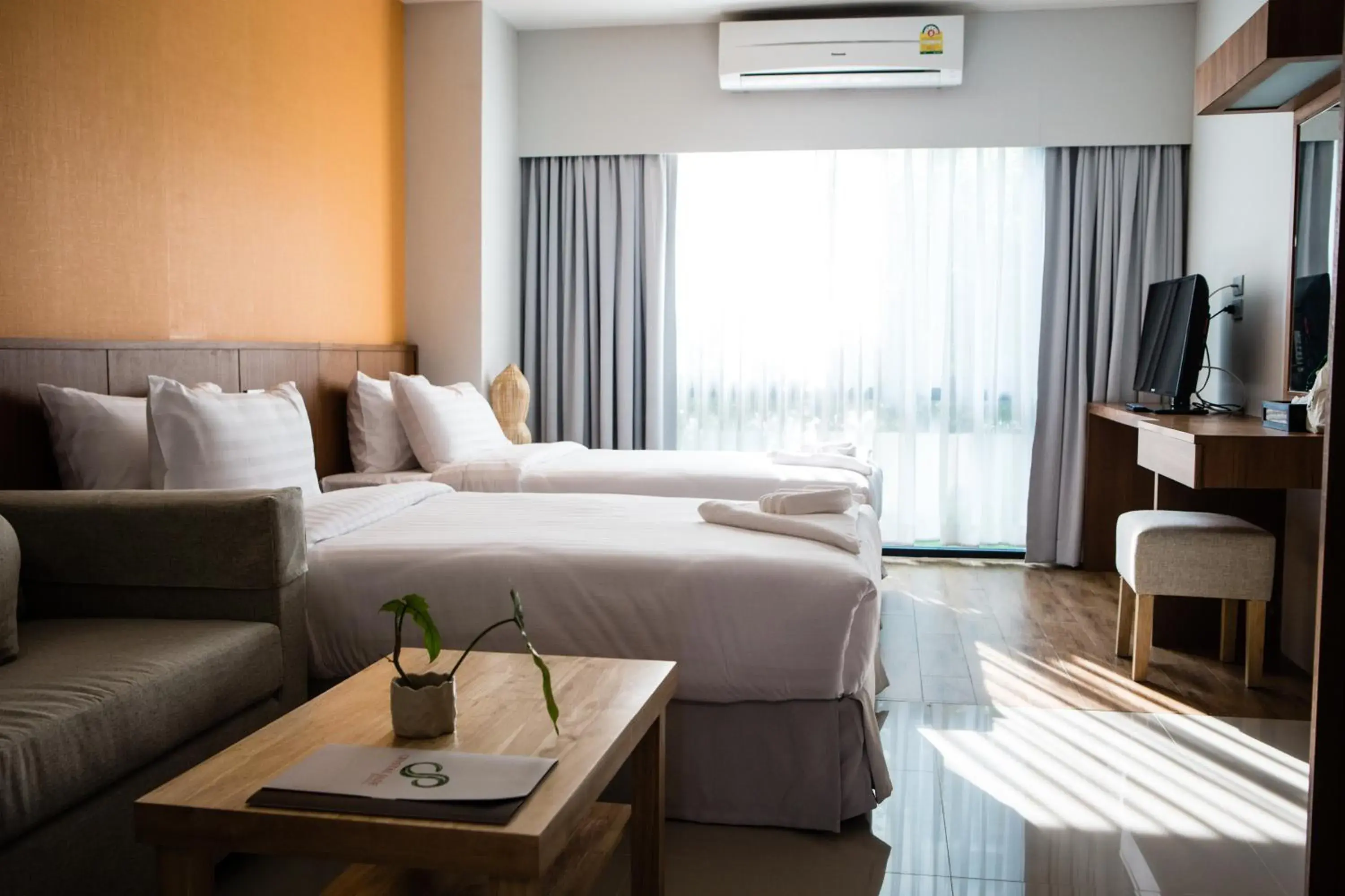 Bed in CRYSTAL JADE  RAYONG HOTEL