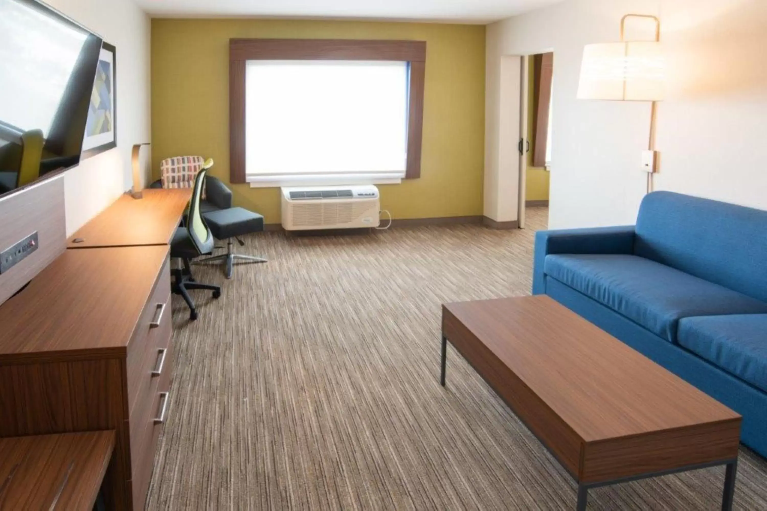 Bedroom, Seating Area in Holiday Inn Express & Suites - North Battleford, an IHG Hotel