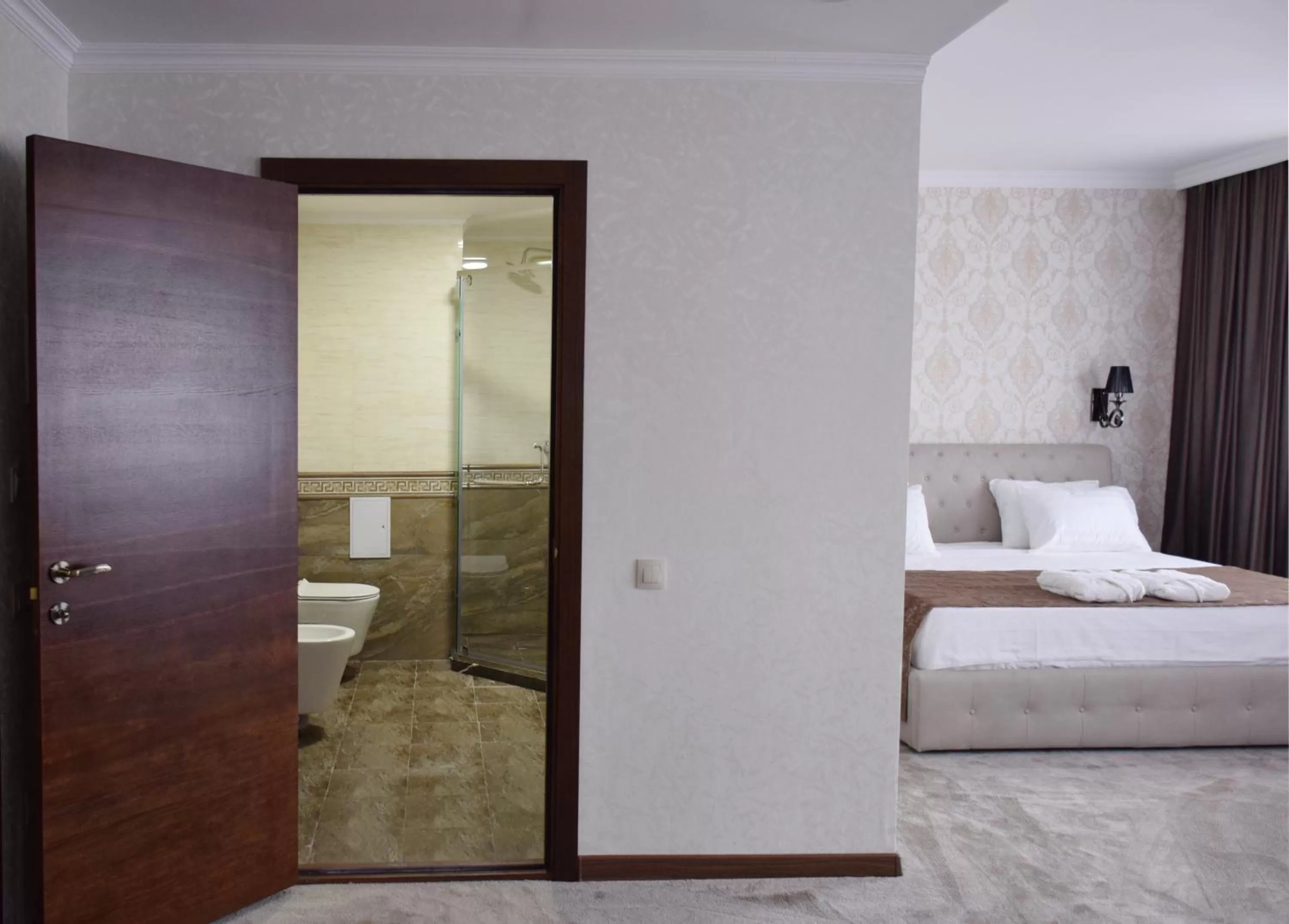 Bathroom, Bed in MirOtel Hotel