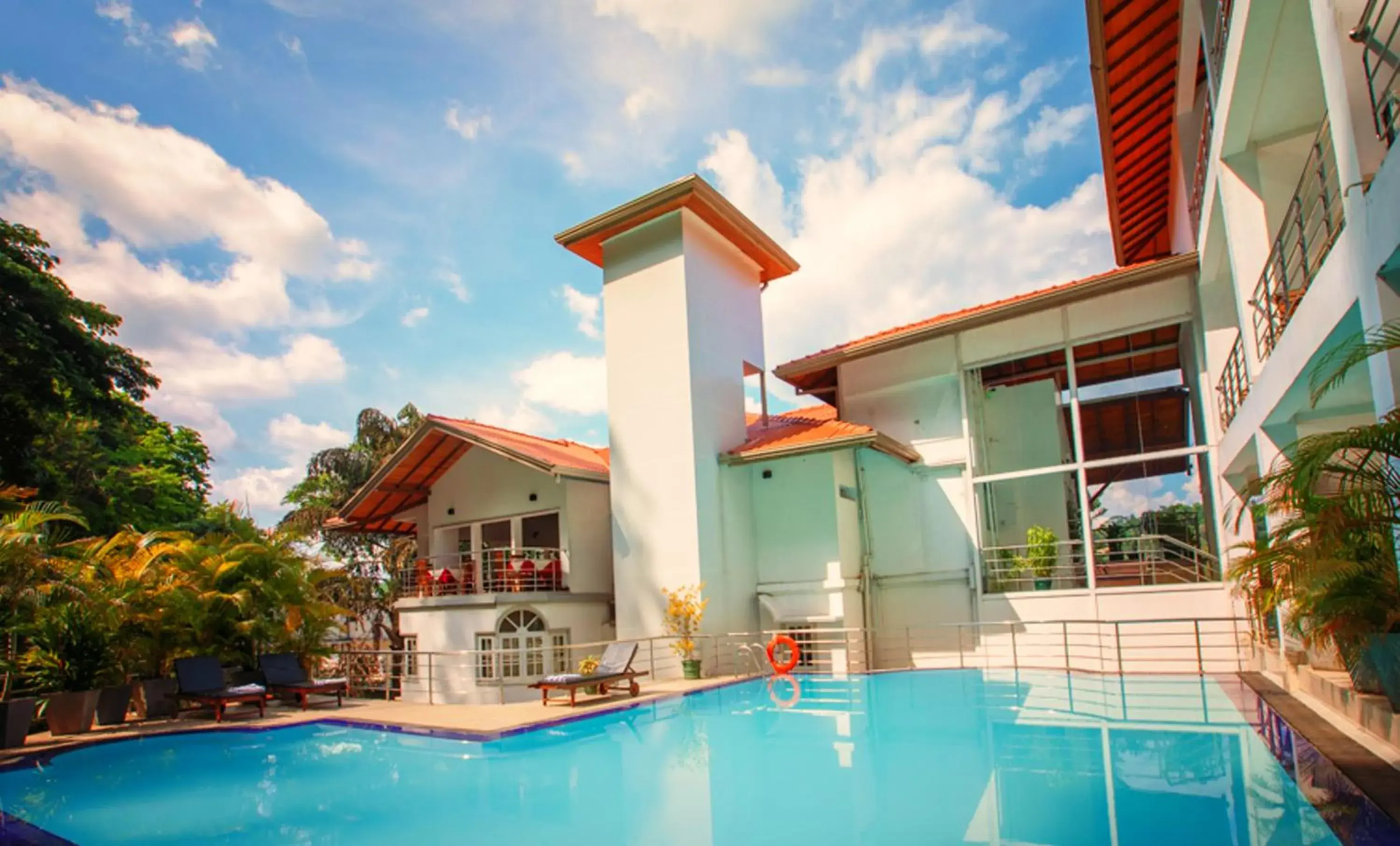 Swimming pool, Property Building in Senani Hotel