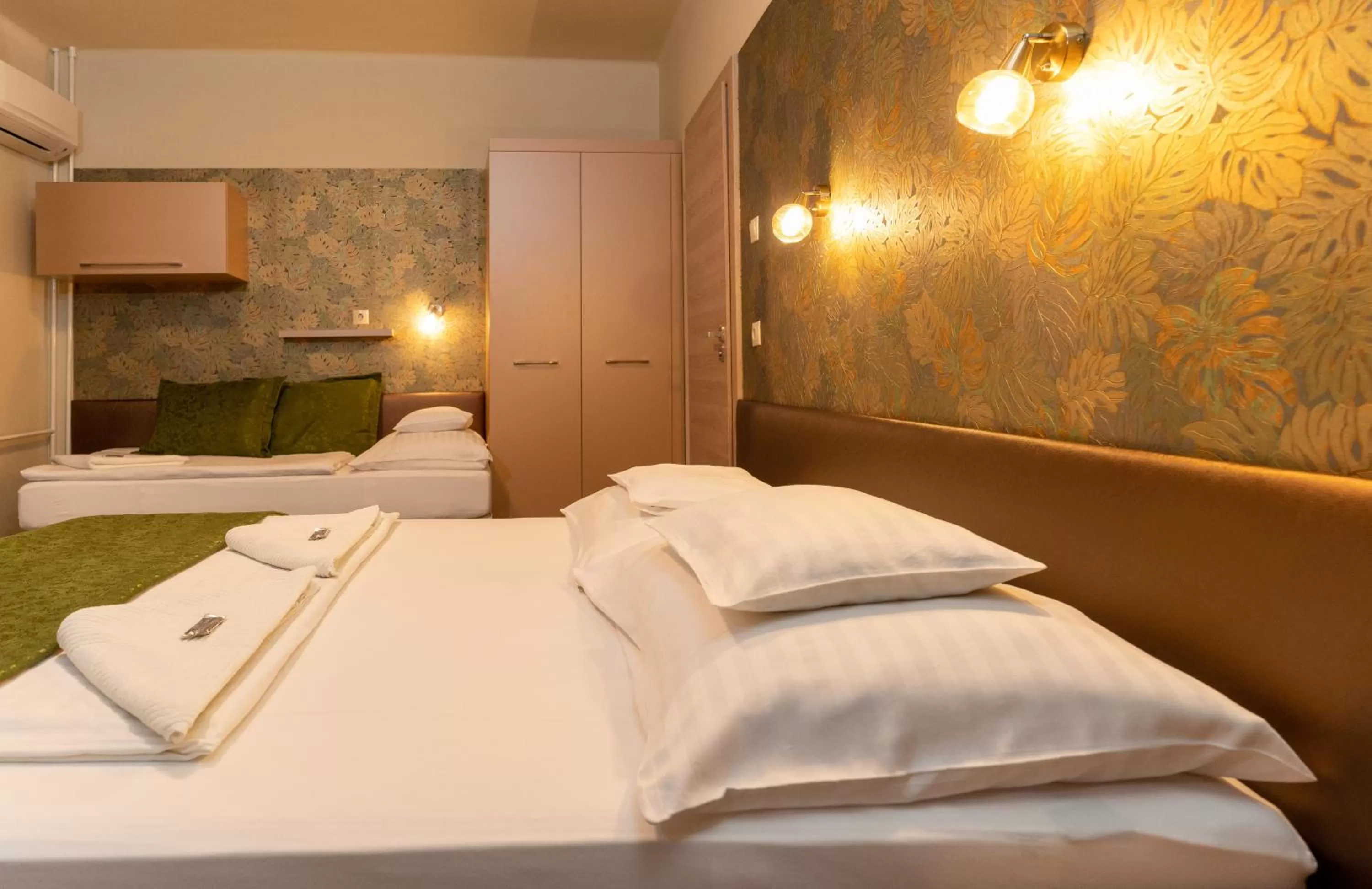 Bed in Teátrum Boutique Hotel