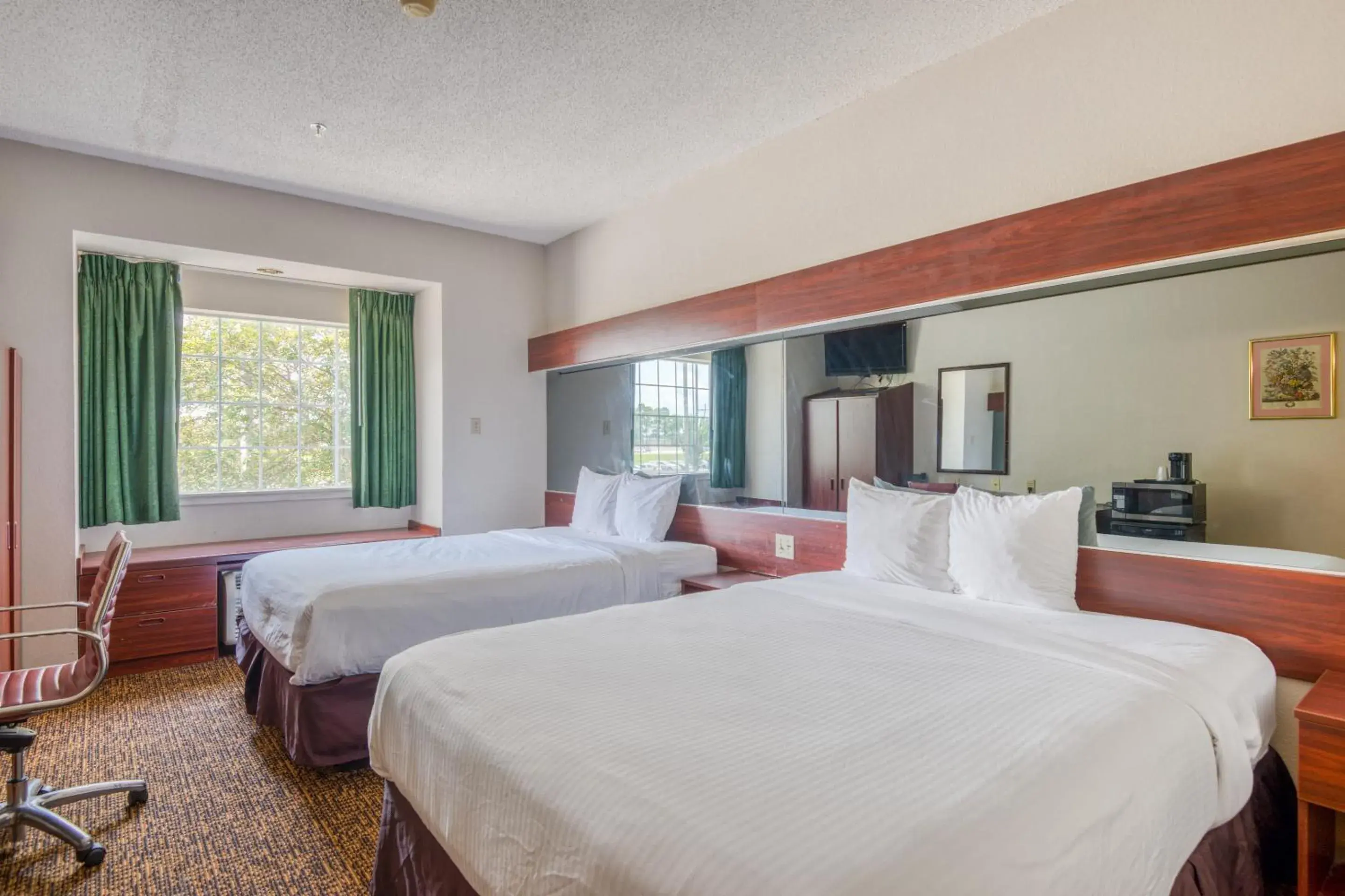 Bedroom, Bed in Trident Inn & Suites, Baton Rouge