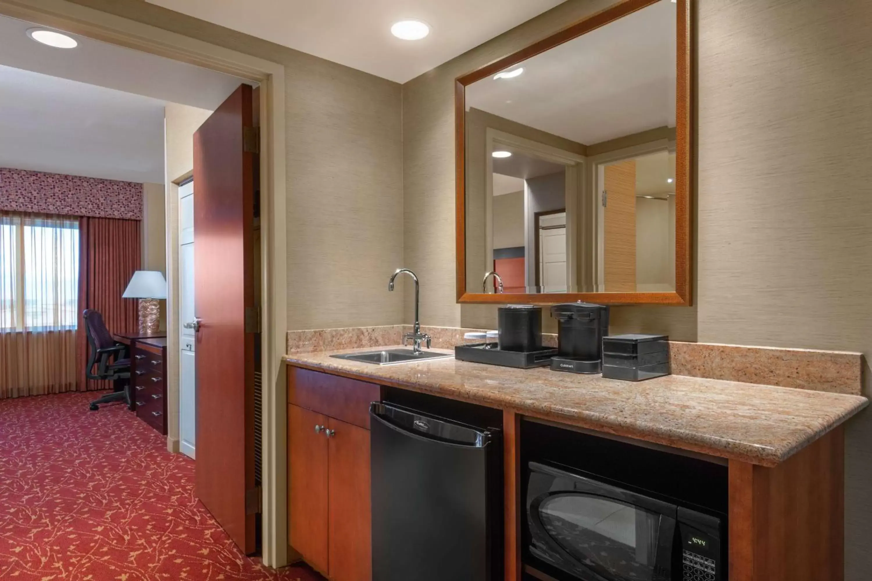 Kitchen or kitchenette, Bathroom in Embassy Suites Loveland Hotel, Spa & Conference Center