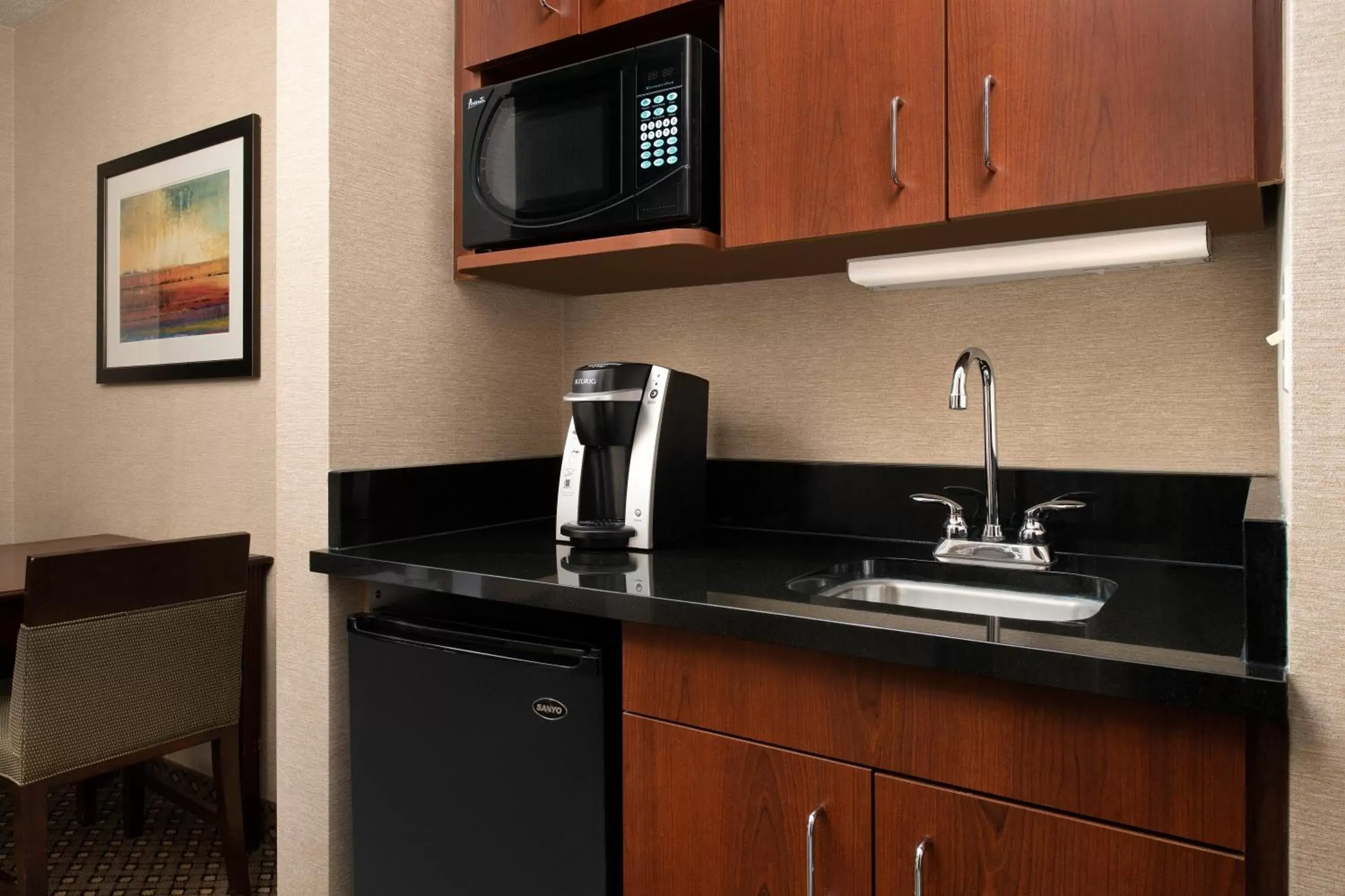 Photo of the whole room, Kitchen/Kitchenette in Holiday Inn Express & Suites by IHG Chambersburg, an IHG Hotel