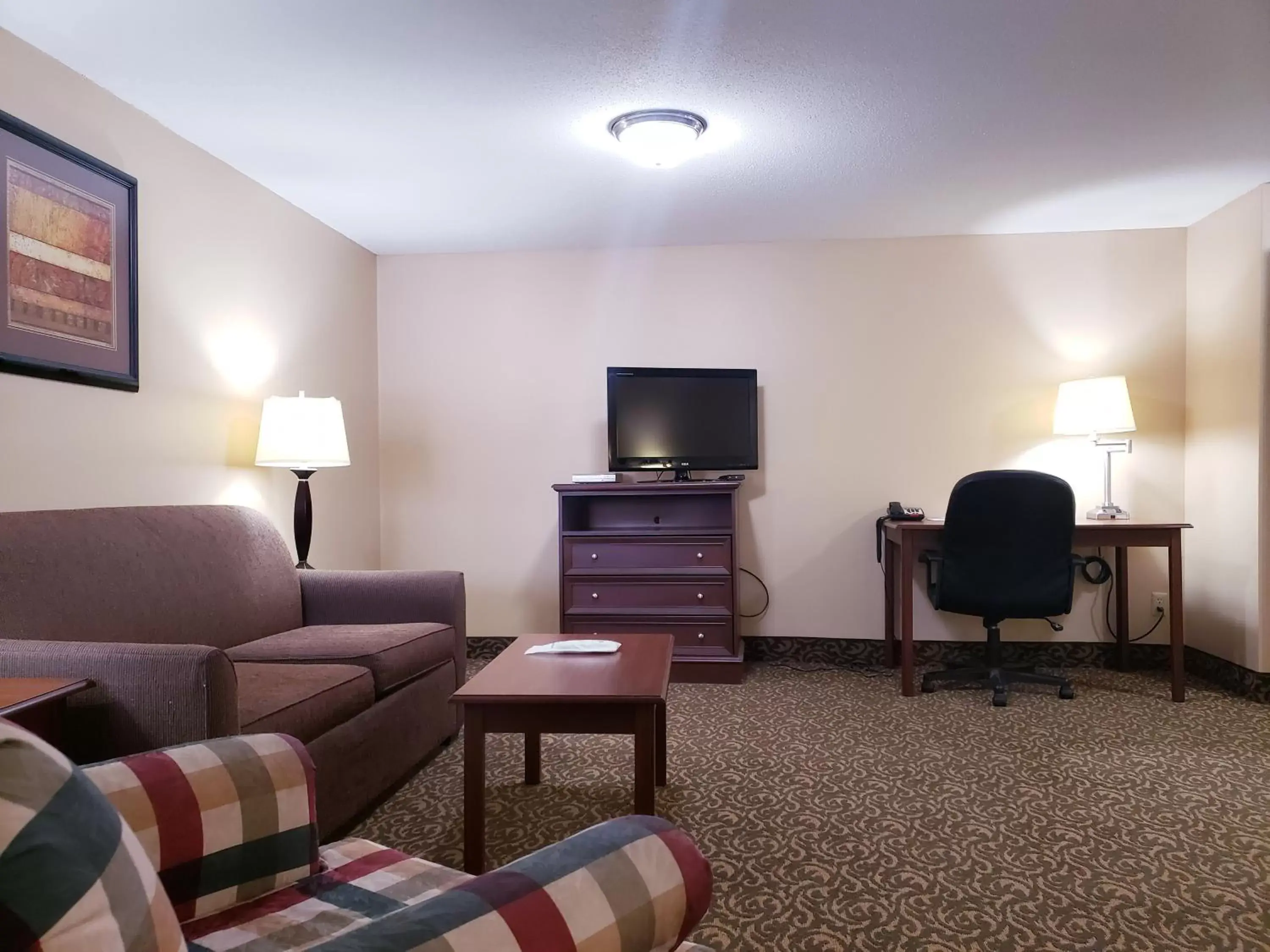 TV/Entertainment Center in SureStay Plus Hotel by Best Western Black River Falls