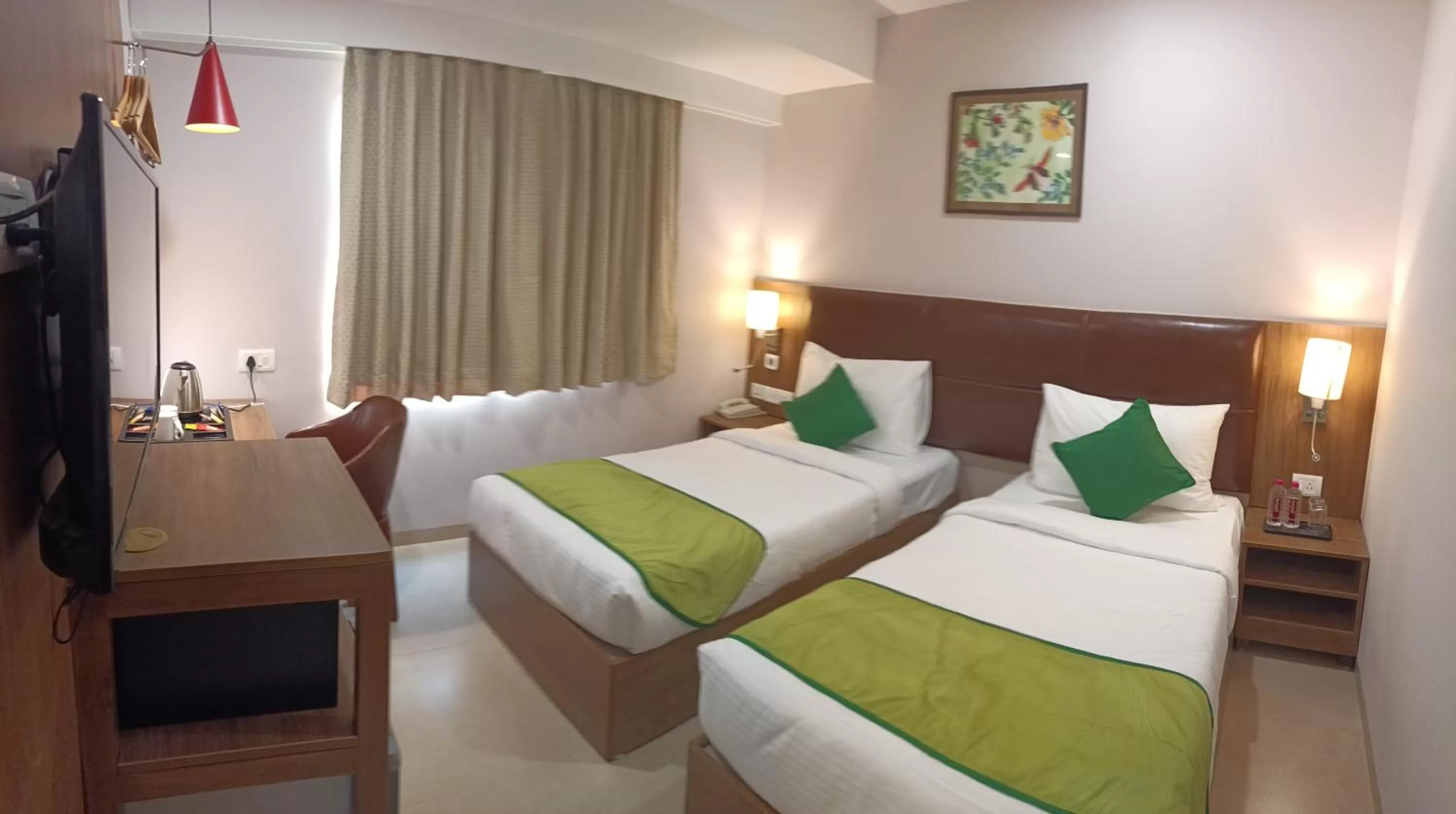 Bed in The Beacon Hotel Vadodara