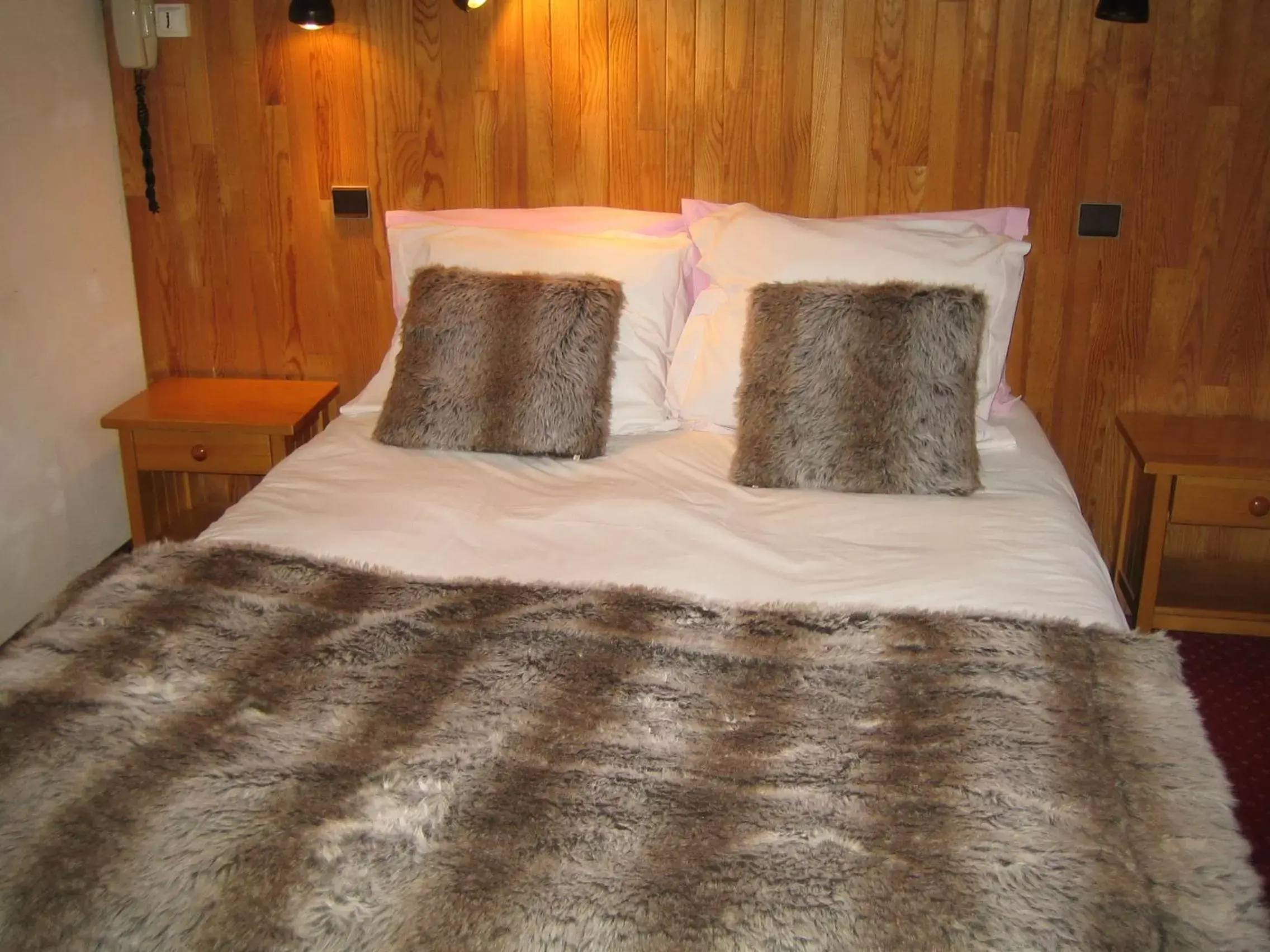 Bed in Chalet Hotel Régina