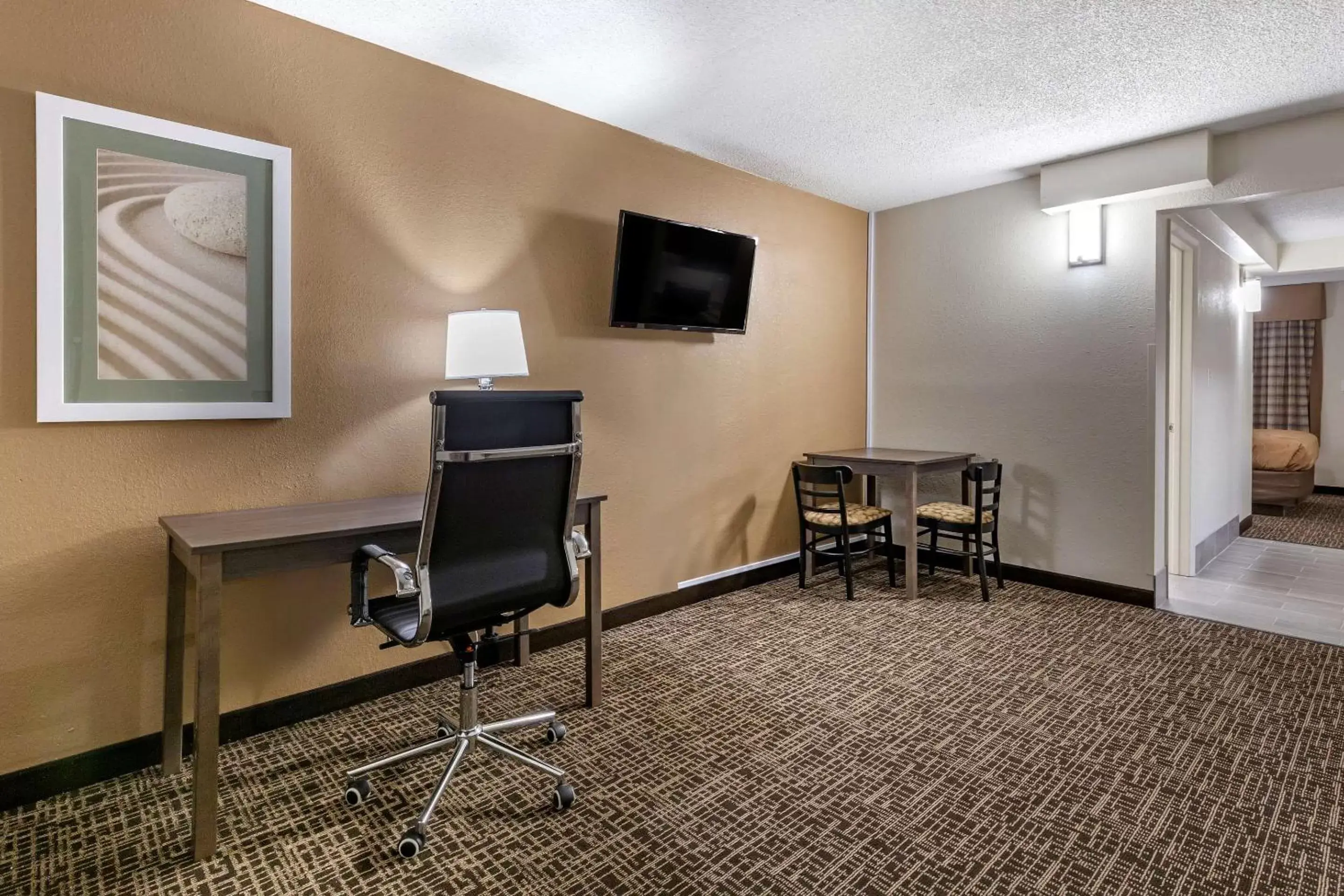 Photo of the whole room, TV/Entertainment Center in Quality Inn & Suites Spring Lake - Fayetteville Near Fort Liberty