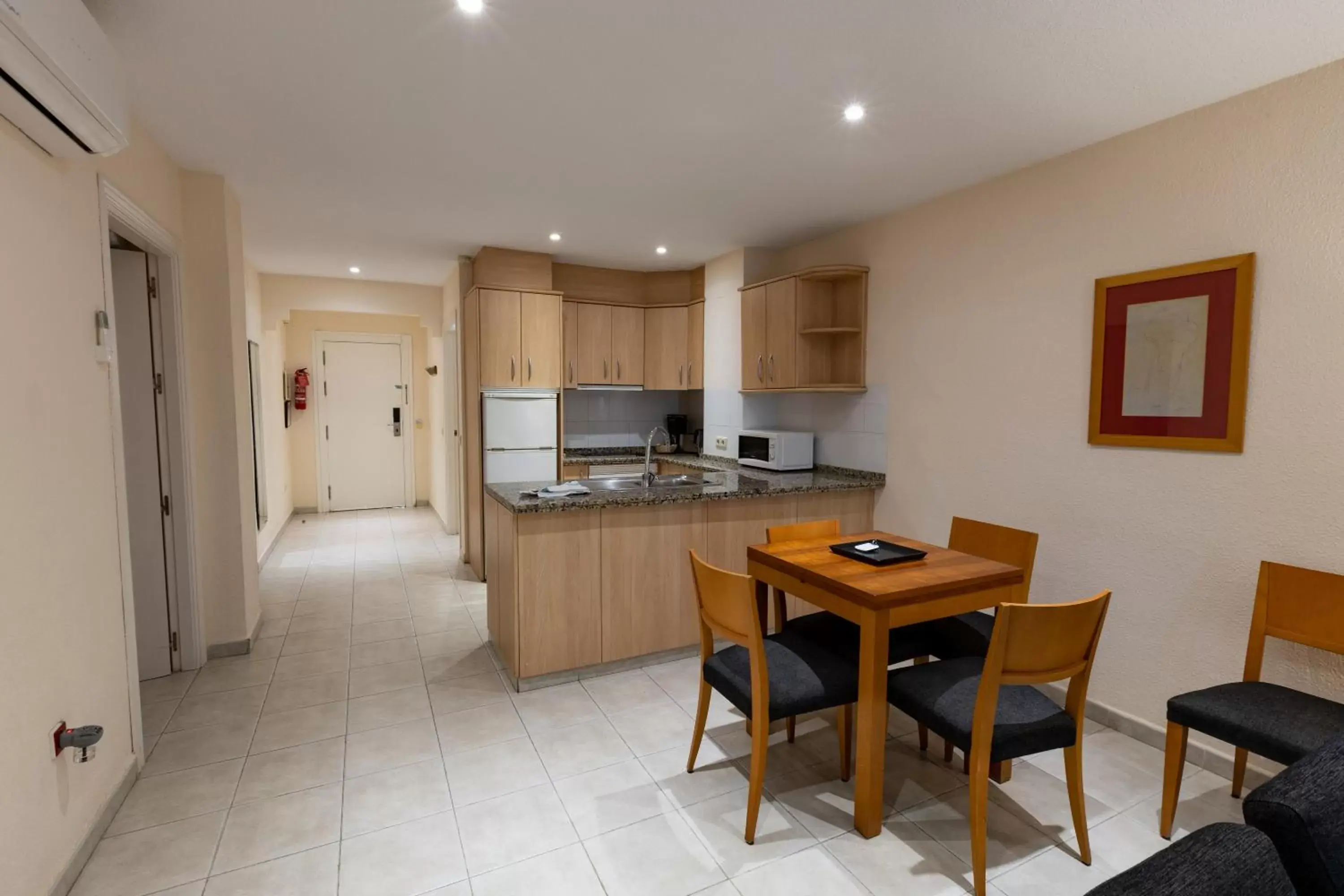 Dining area, Kitchen/Kitchenette in Ramada Hotel & Suites by Wyndham Costa del Sol