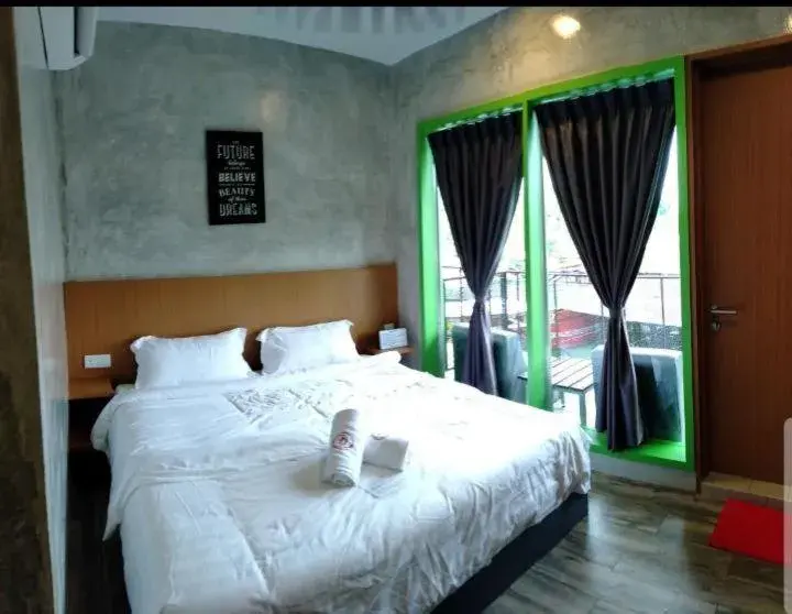 Bed in Rick Resort Teluk Intan