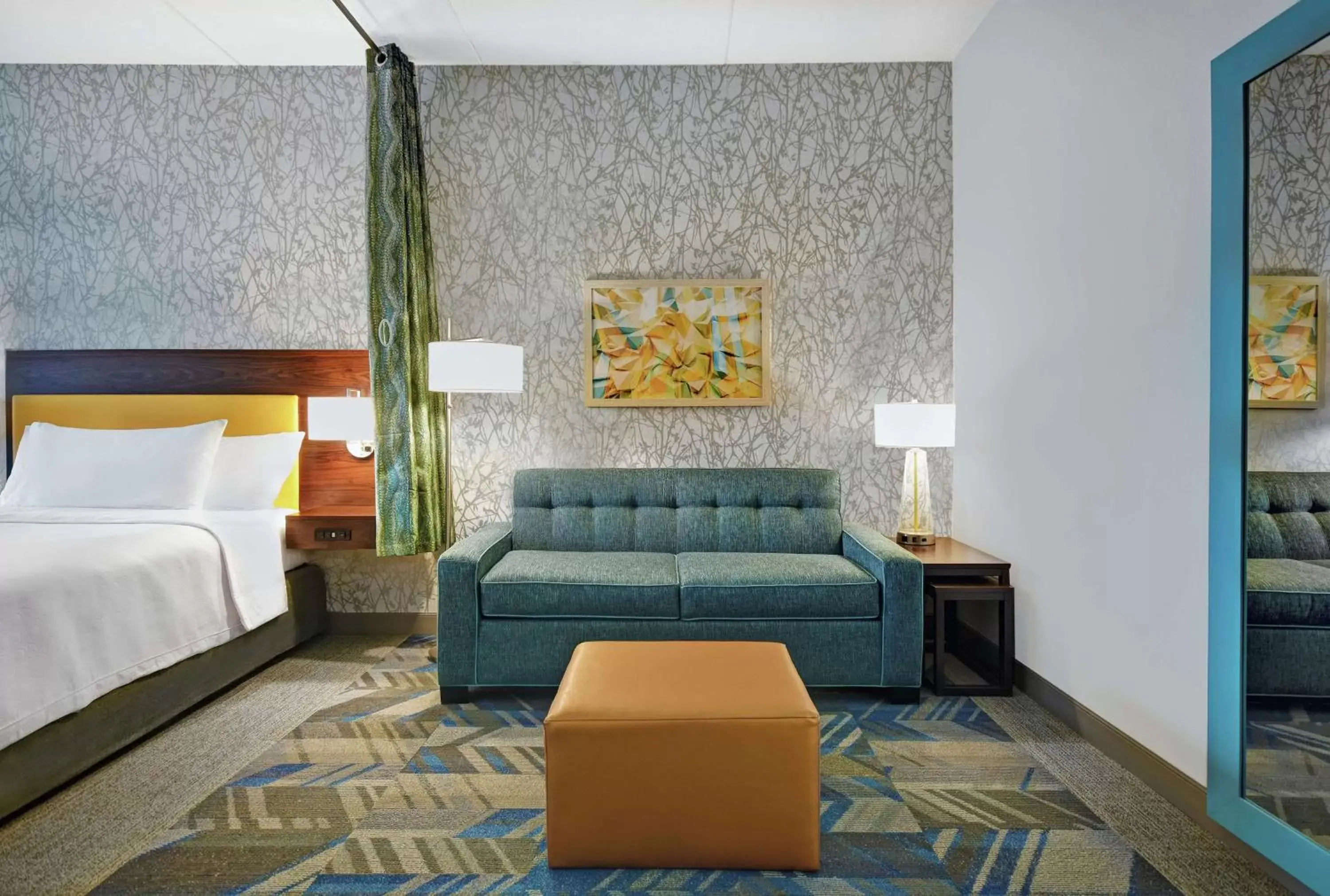 Living room, Bed in Home2 Suites By Hilton Lawrenceville Atlanta Sugarloaf, Ga