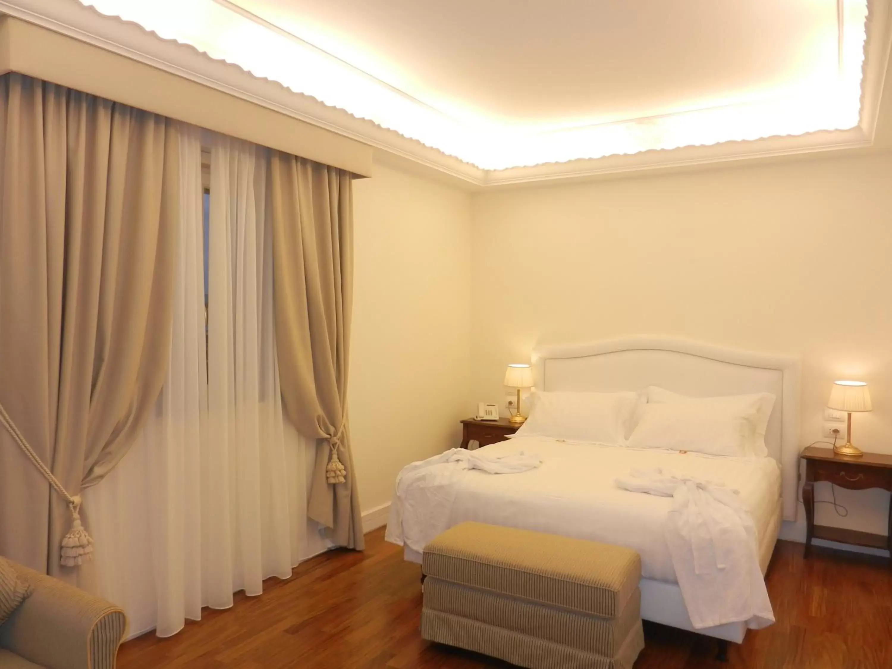 Deluxe Quadruple Room in Hotel Villa Michelangelo Deluxe Quadruple Room in Hotel Villa Michelangelo