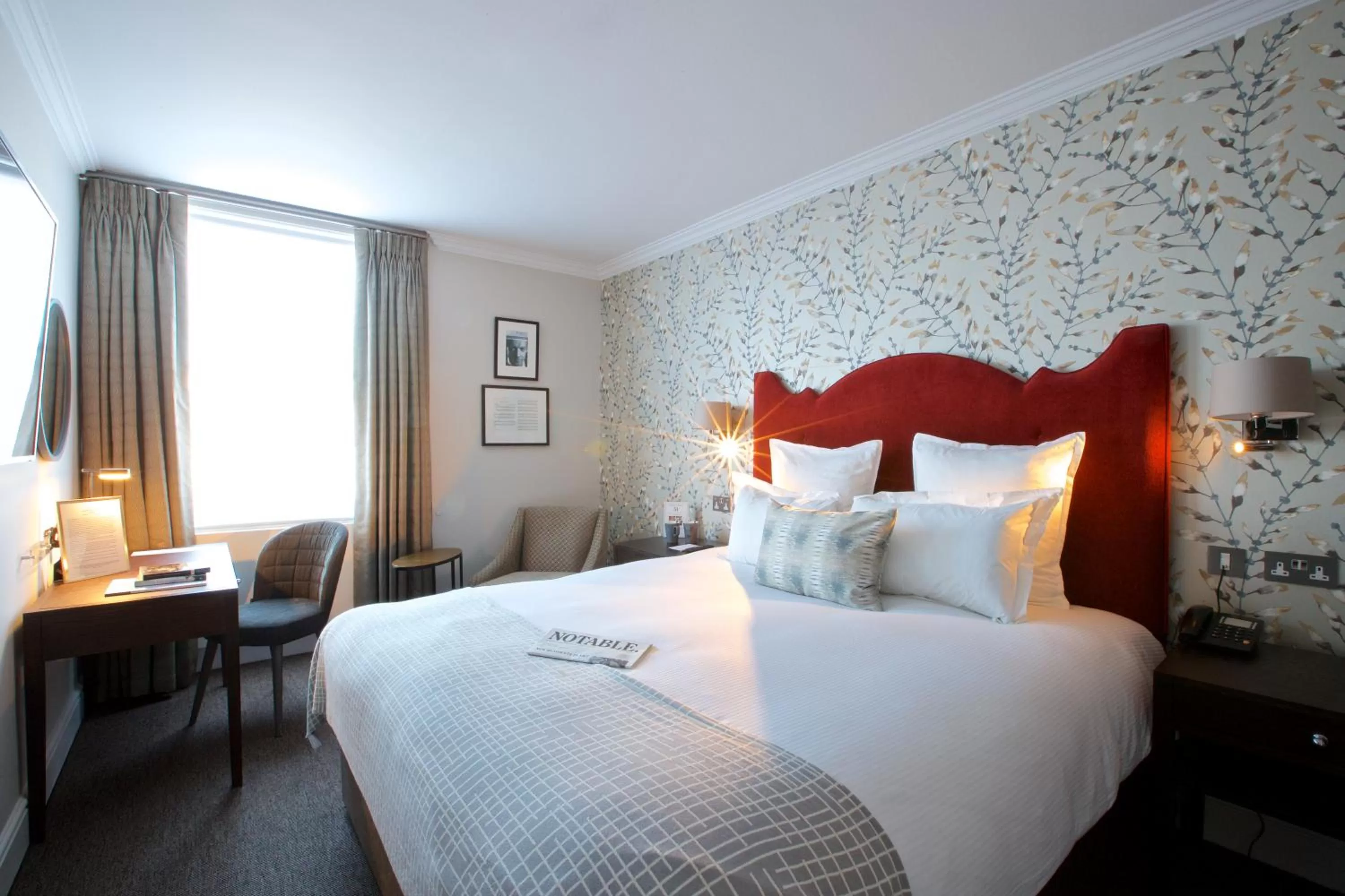 Bed in 54 Queen's Gate Hotel