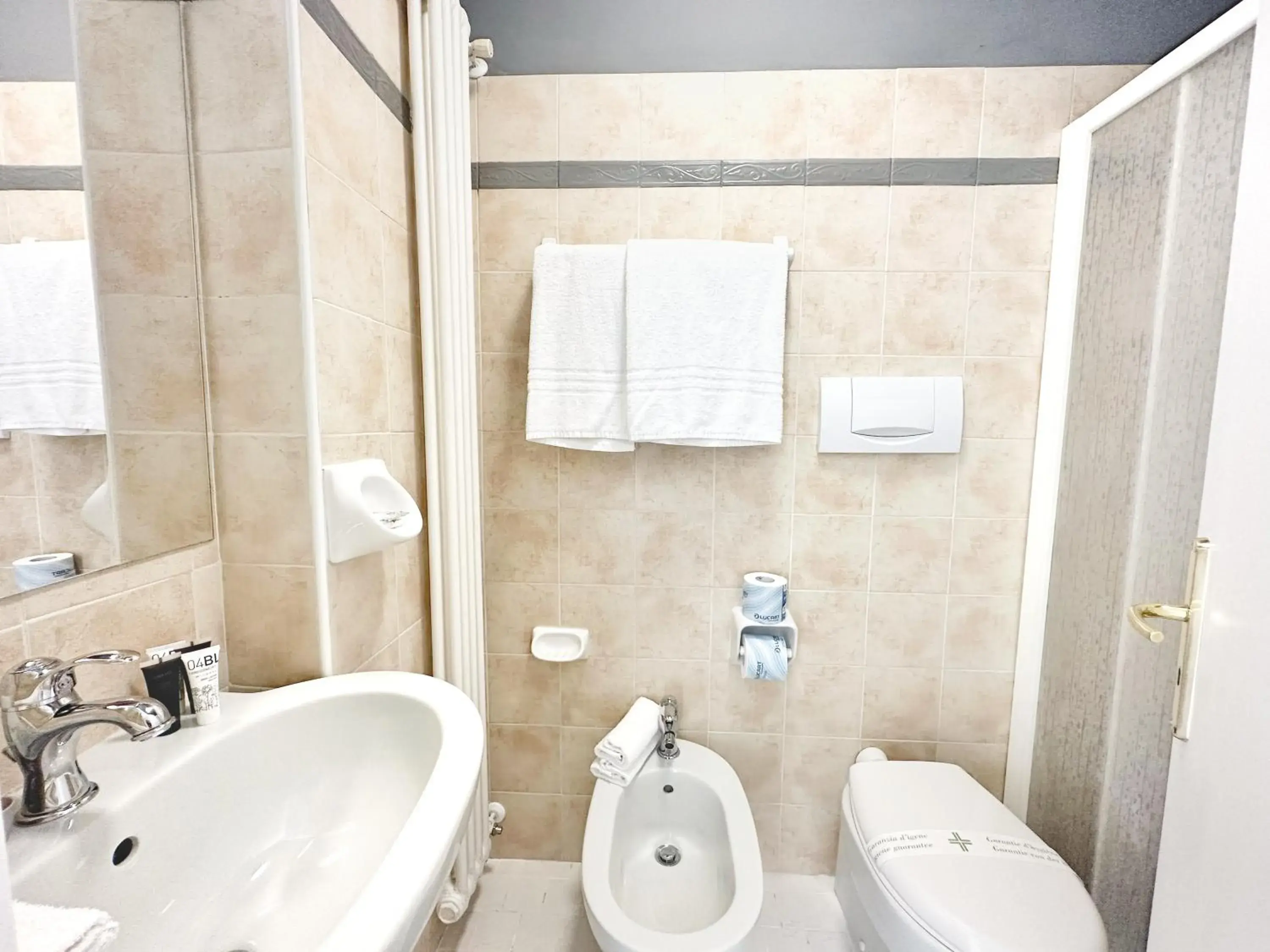Toilet, Bathroom in Aura Living Hotel
