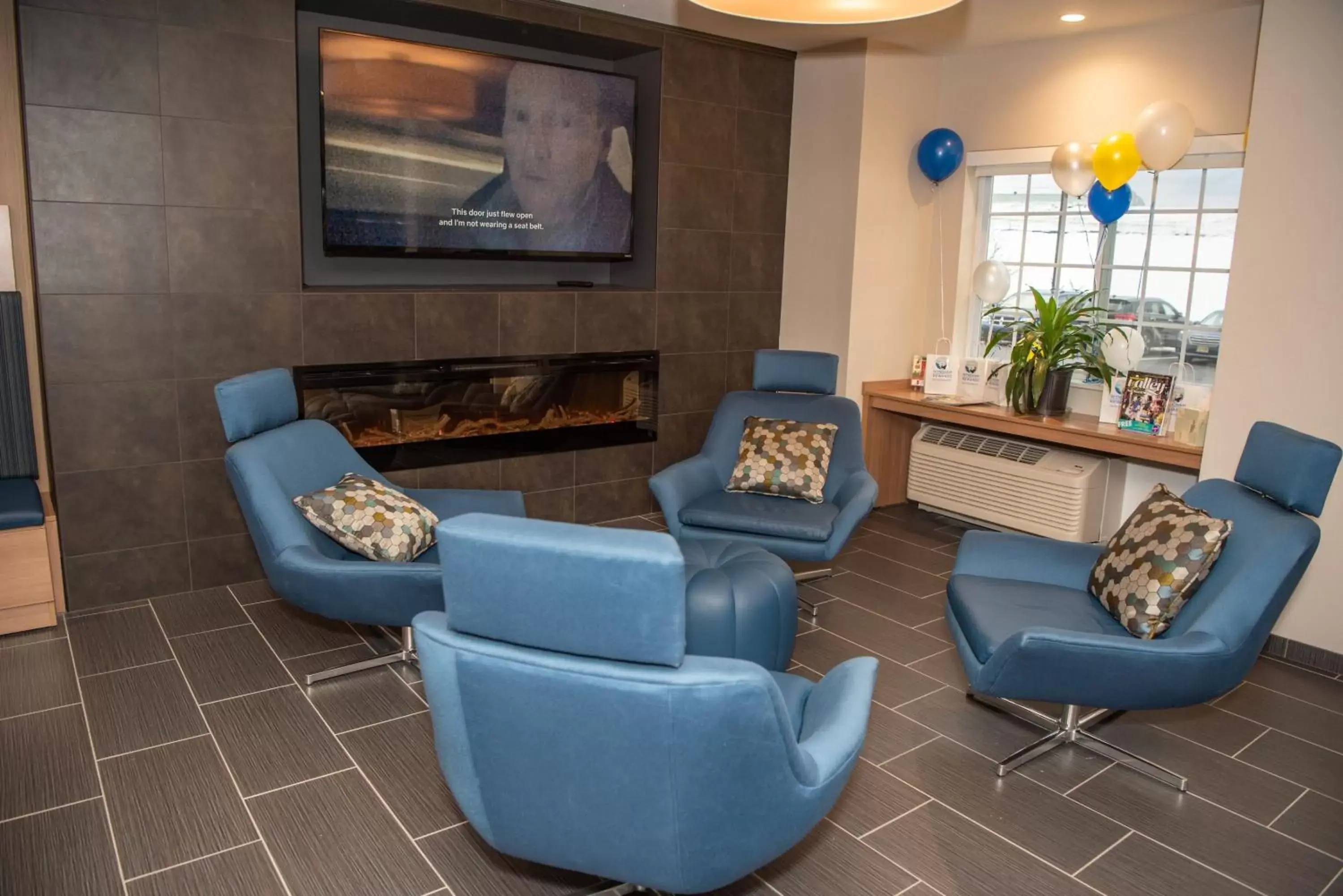 Communal lounge/ TV room, Seating Area in Microtel Inn & Suites by Wyndham Carlisle