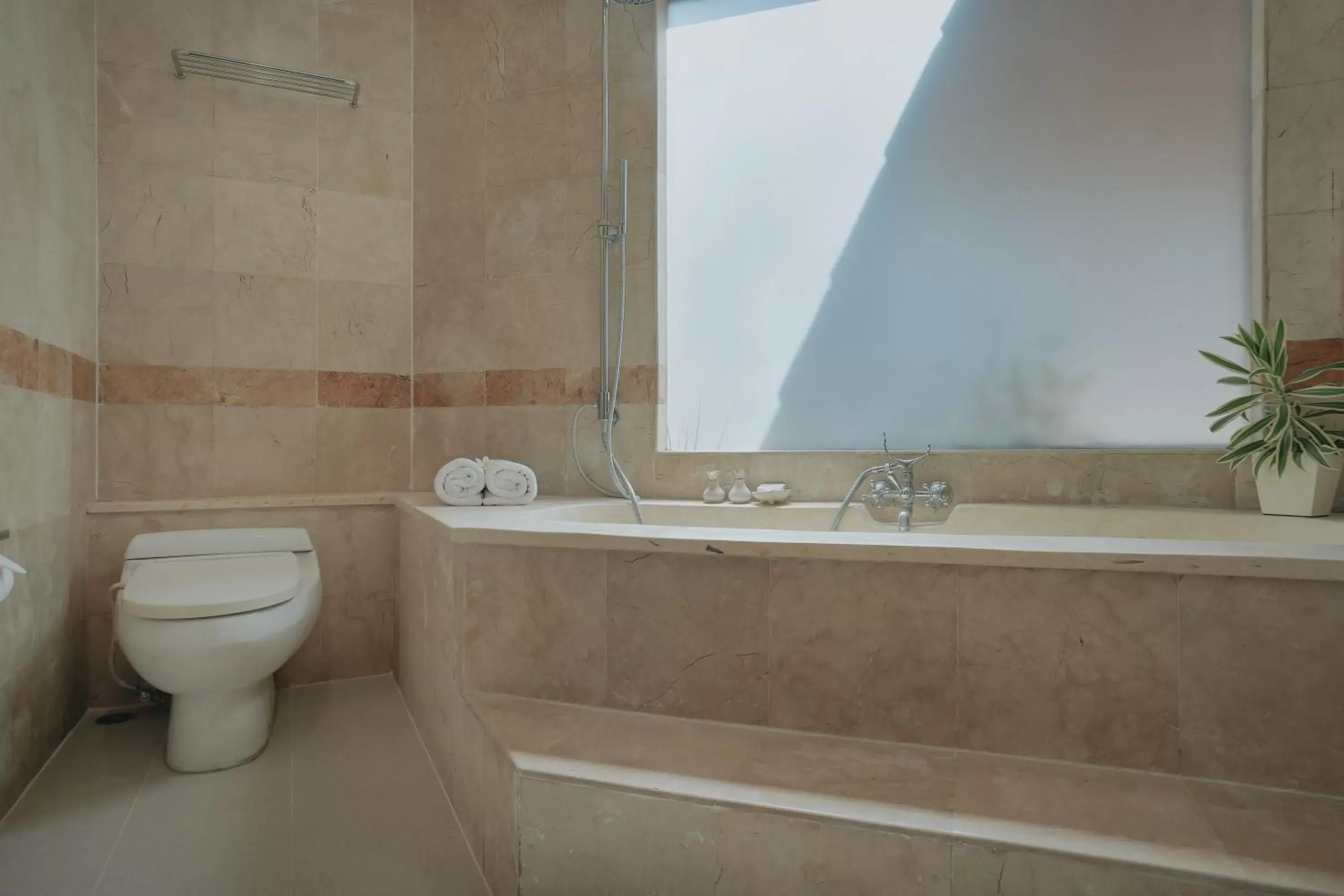 Bath, Bathroom in Parigata Villas Resort