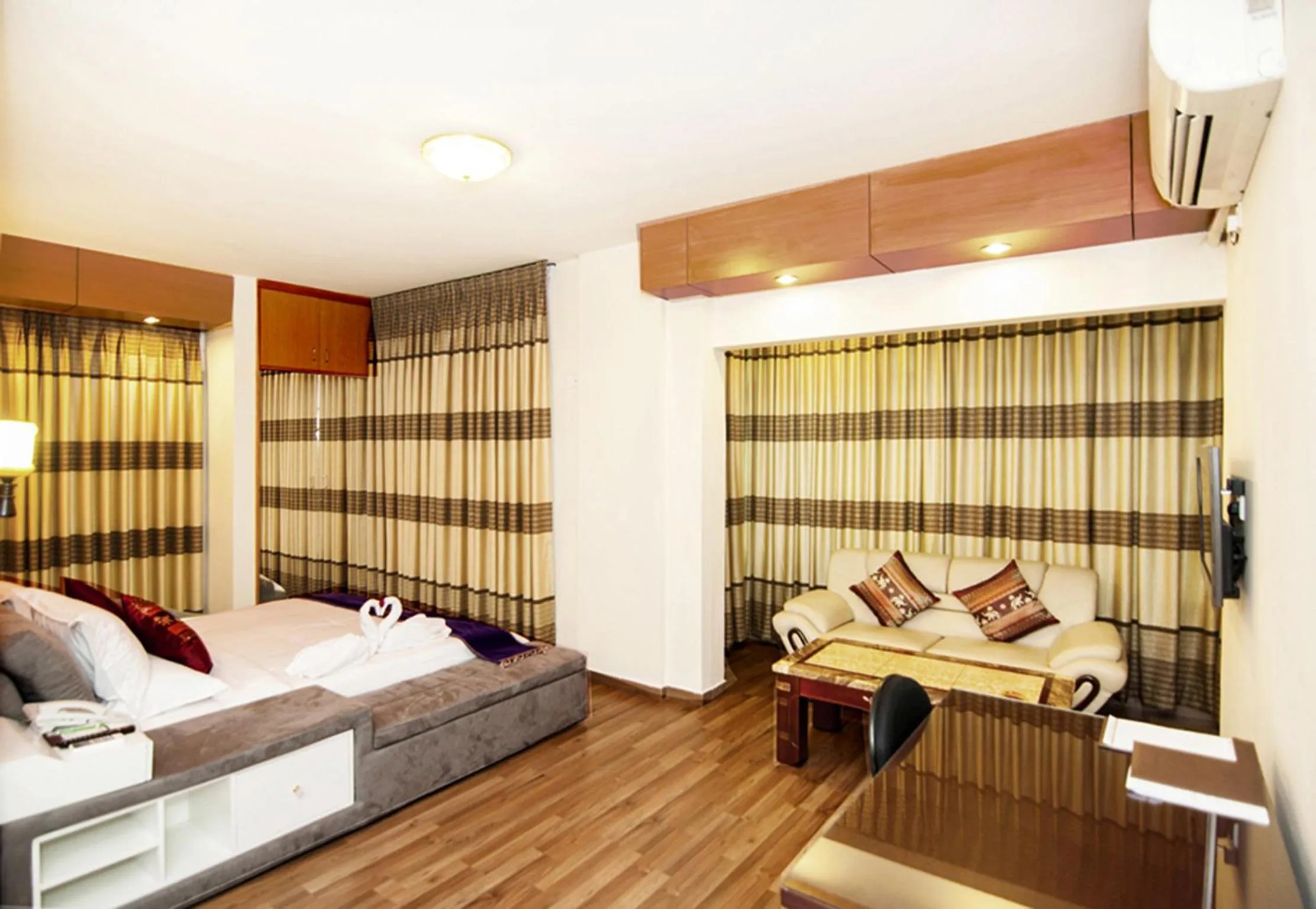 Seating area, Bed in Century Park Residence